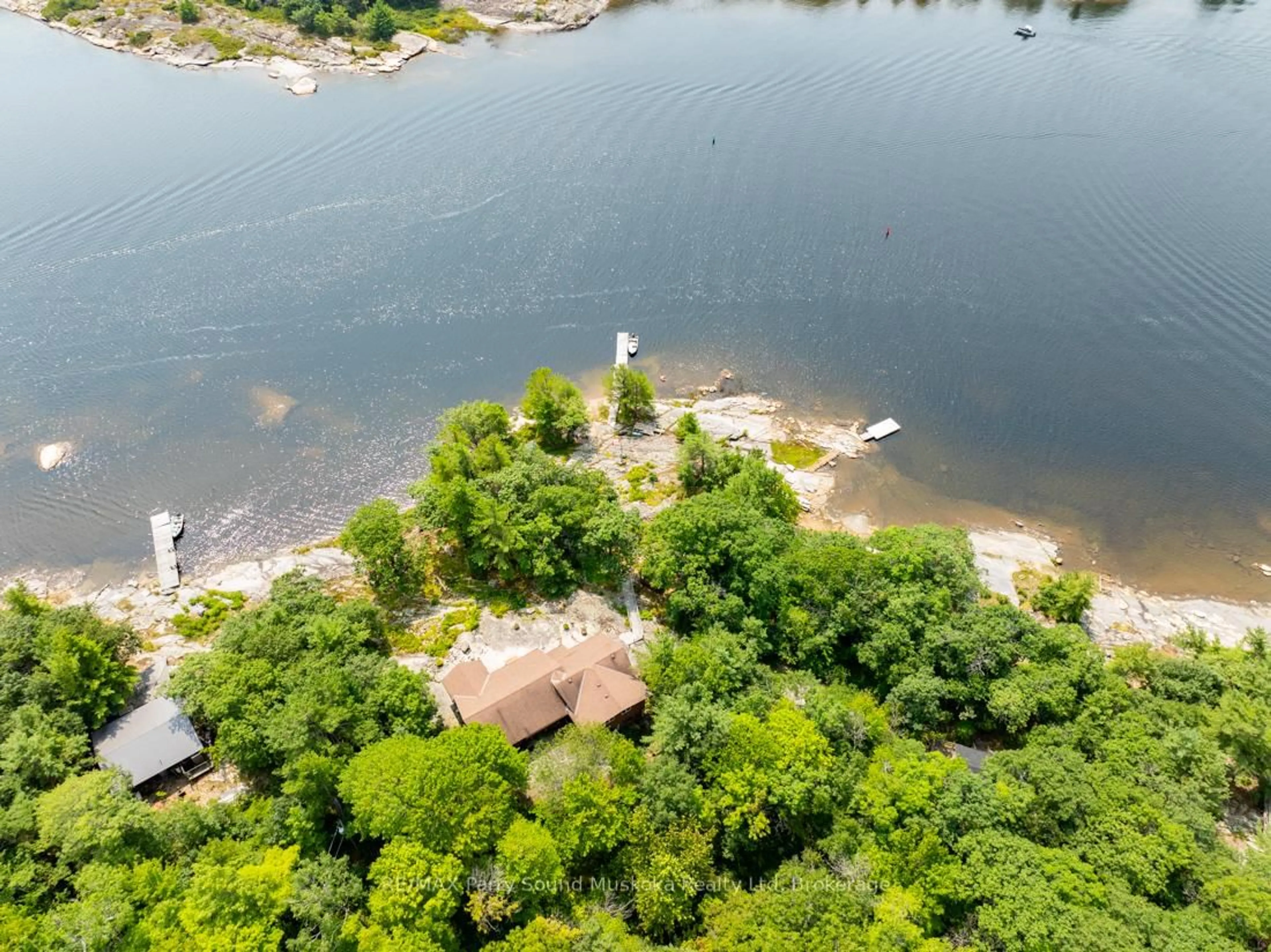 A pic from outside/outdoor area/front of a property/back of a property/a pic from drone, water/lake/river/ocean view for 16 Island 264c, Carling Ontario P0G 1G0
