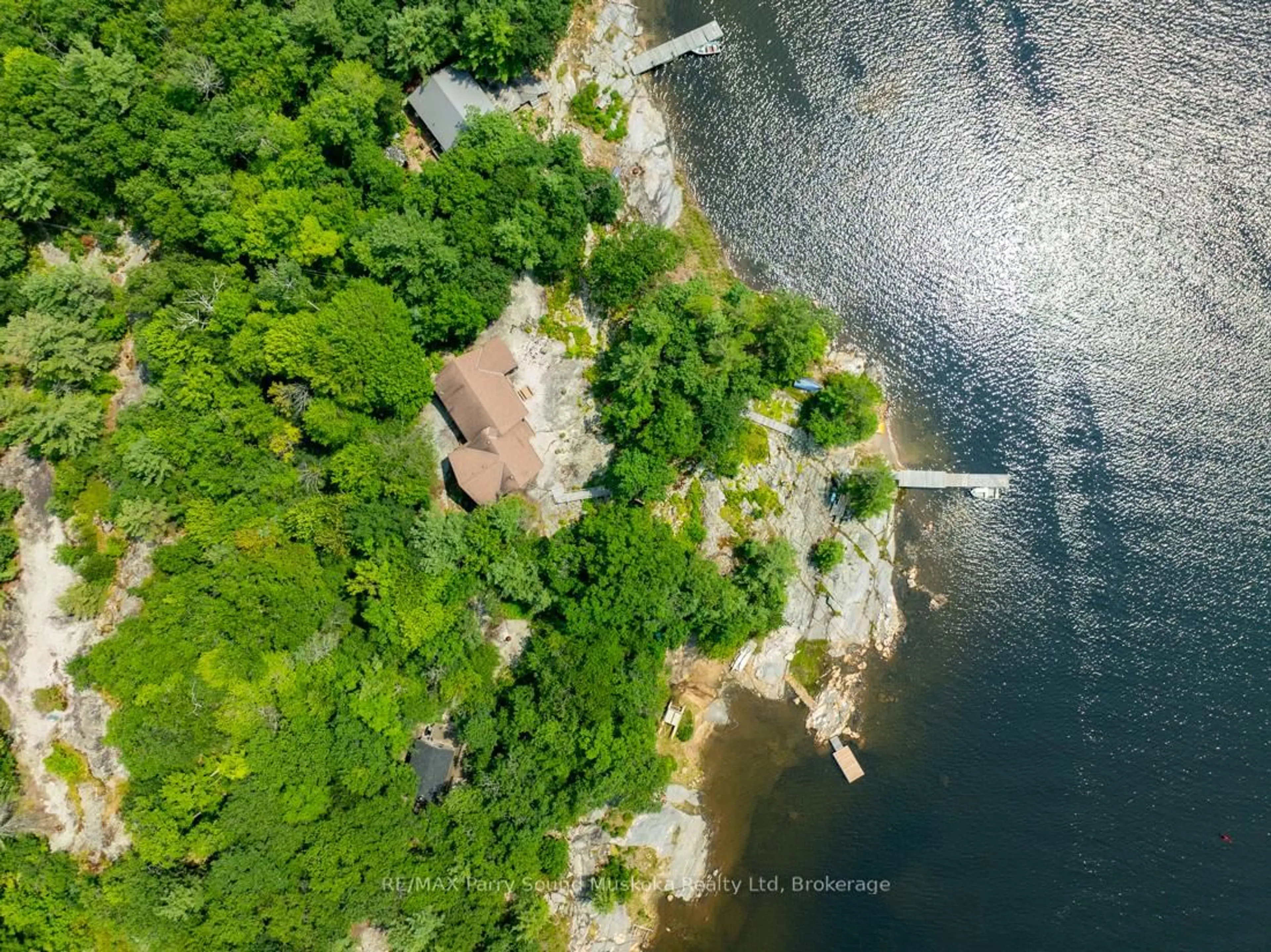 A pic from outside/outdoor area/front of a property/back of a property/a pic from drone, water/lake/river/ocean view for 16 Island 264c, Carling Ontario P0G 1G0