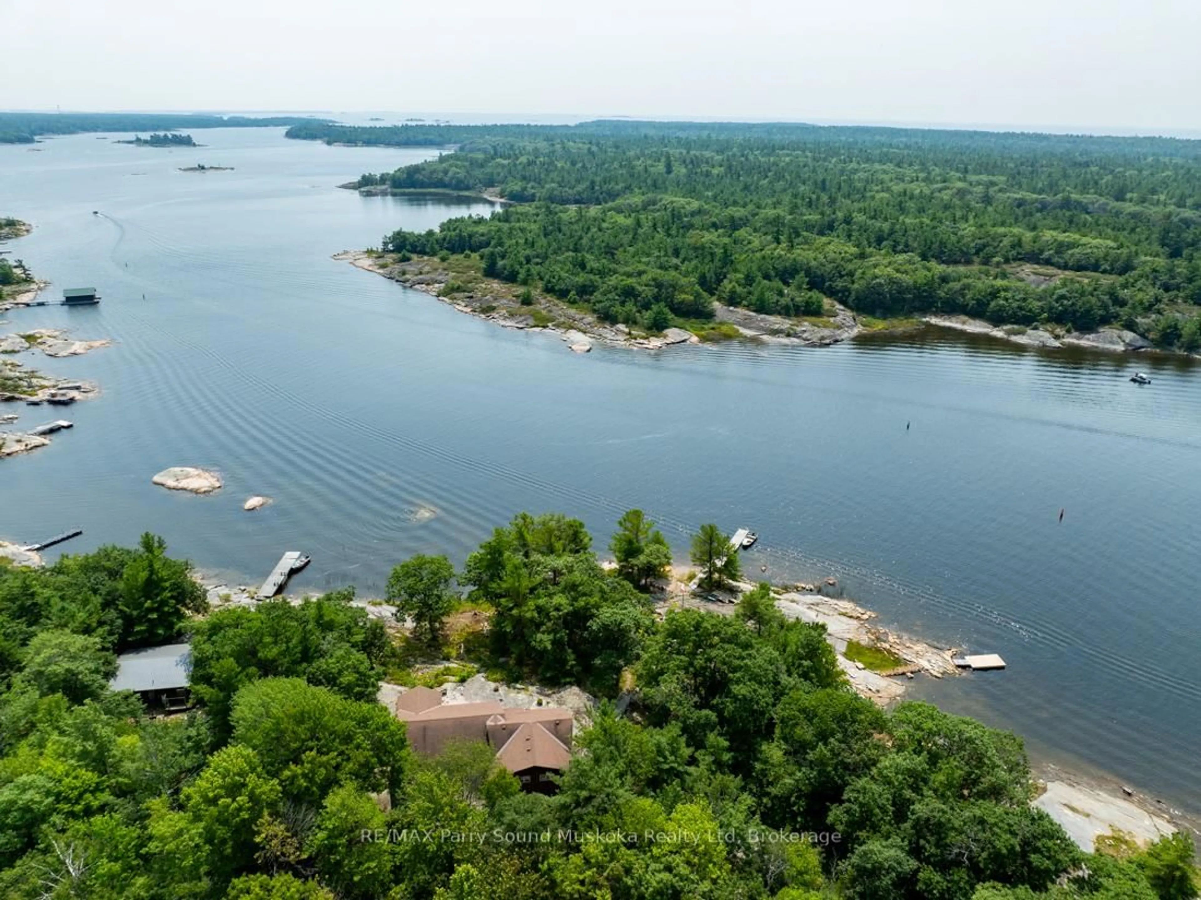 A pic from outside/outdoor area/front of a property/back of a property/a pic from drone, water/lake/river/ocean view for 16 Island 264c, Carling Ontario P0G 1G0