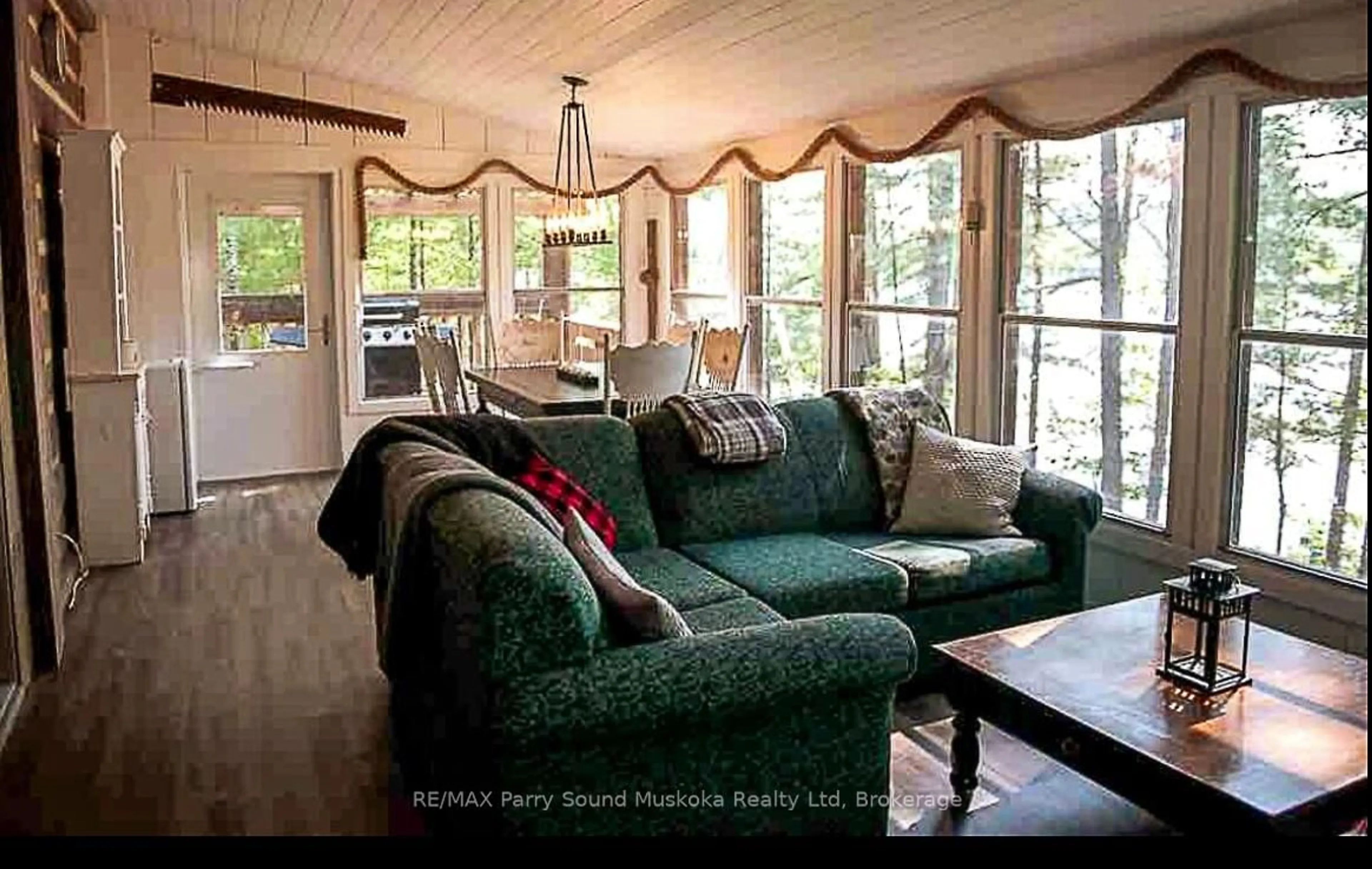 Living room with furniture, wood/laminate floor for 10 Harris Lake Water, Parry Sound Remote Area Ontario P0G 1K0