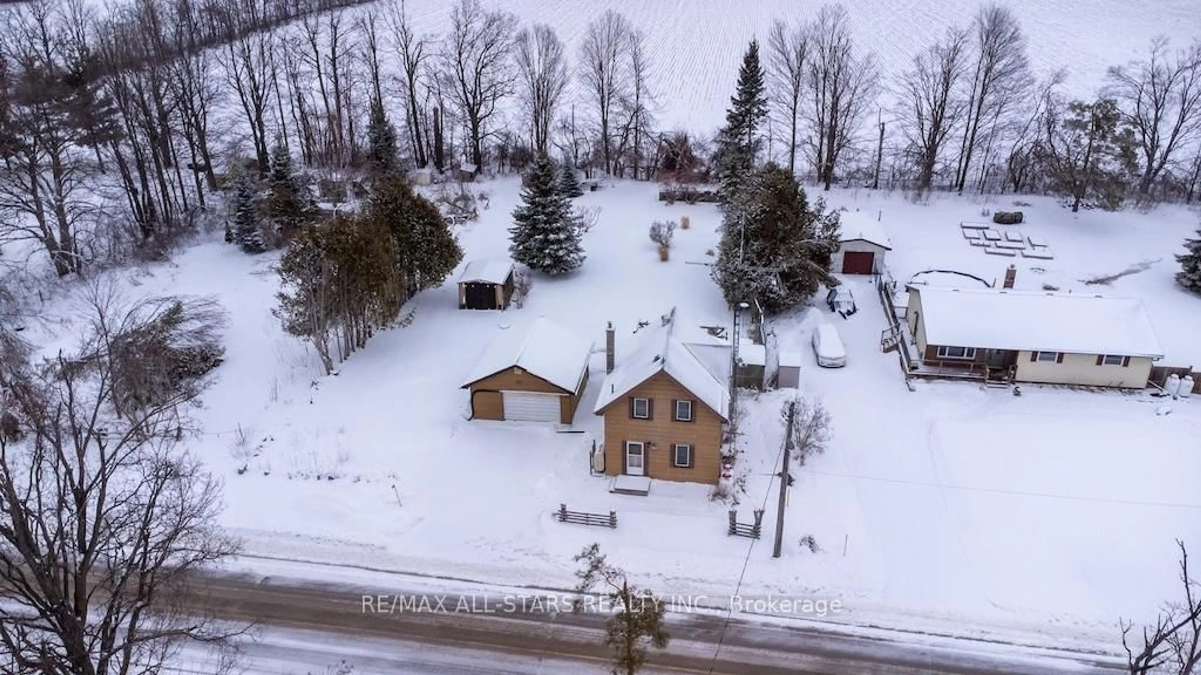A pic from outside/outdoor area/front of a property/back of a property/a pic from drone, street for 534 Fenel Rd, Kawartha Lakes Ontario K0M 2T0