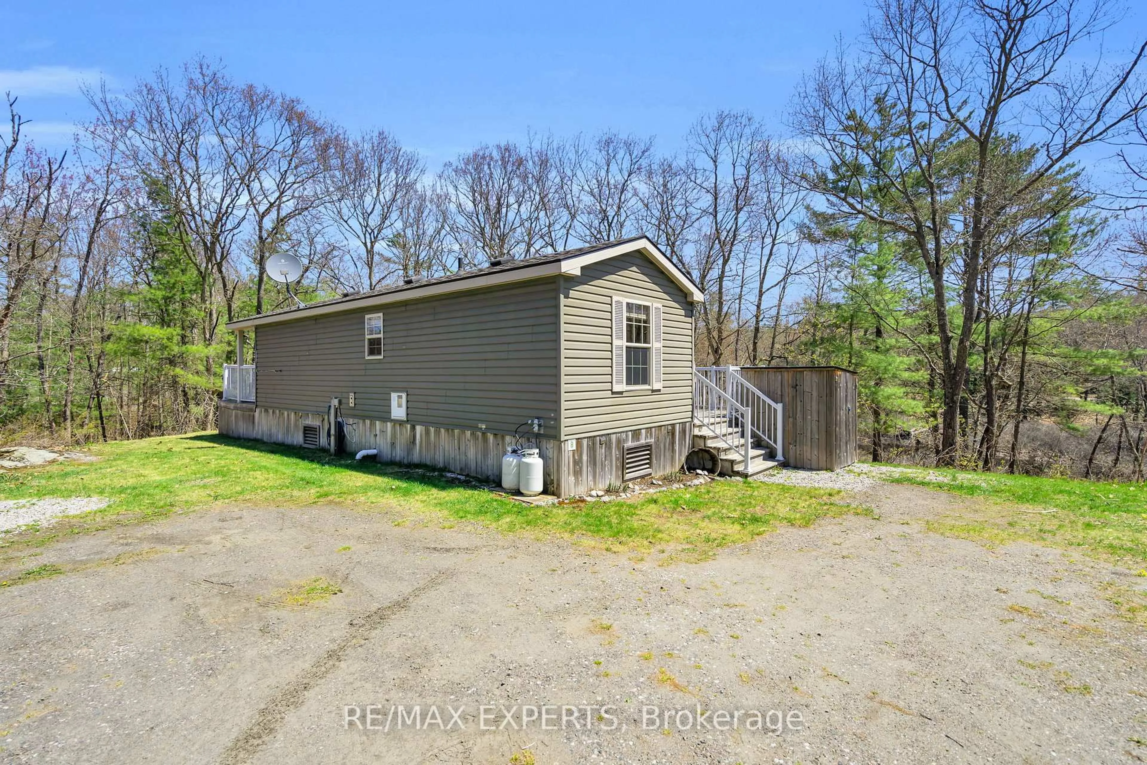 A pic from outside/outdoor area/front of a property/back of a property/a pic from drone, street for 1336 S Morrison Lake Rd #8, Gravenhurst Ontario P0E 1G0