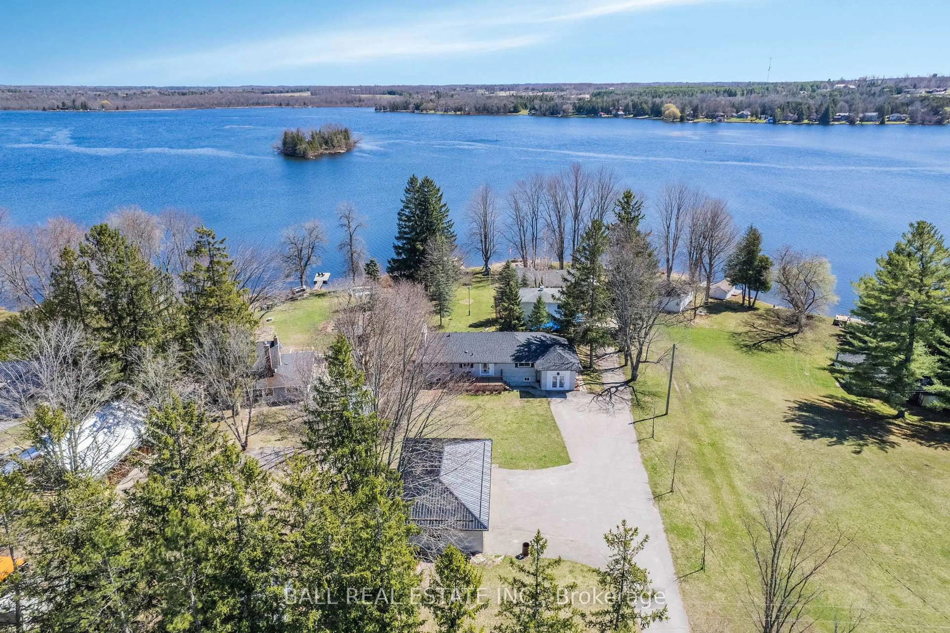 A pic from outside/outdoor area/front of a property/back of a property/a pic from drone, water/lake/river/ocean view for 1749 Young's Point Rd, Selwyn Ontario K0L 2H0