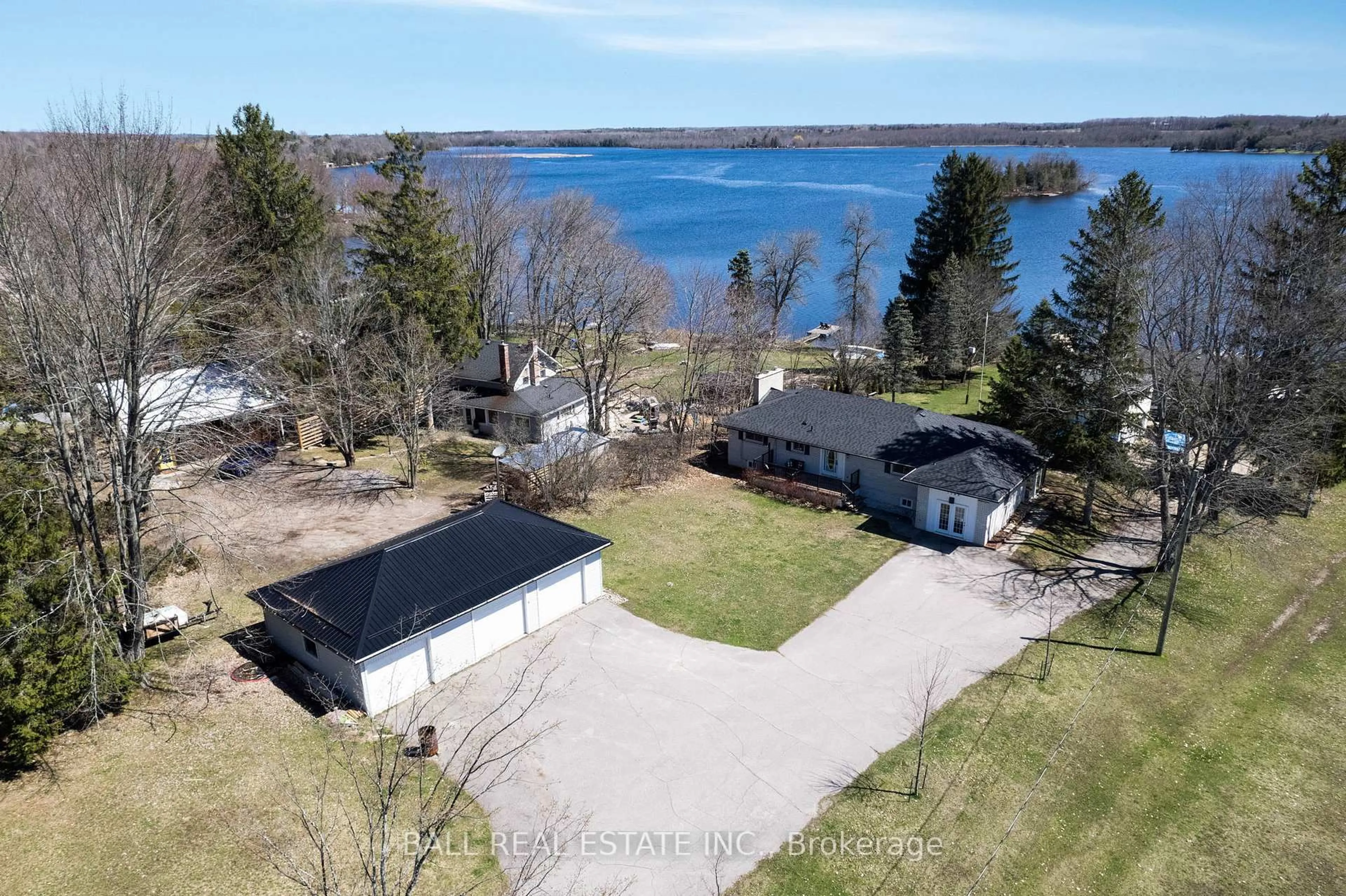 A pic from outside/outdoor area/front of a property/back of a property/a pic from drone, water/lake/river/ocean view for 1749 Young's Point Rd, Selwyn Ontario K0L 2H0
