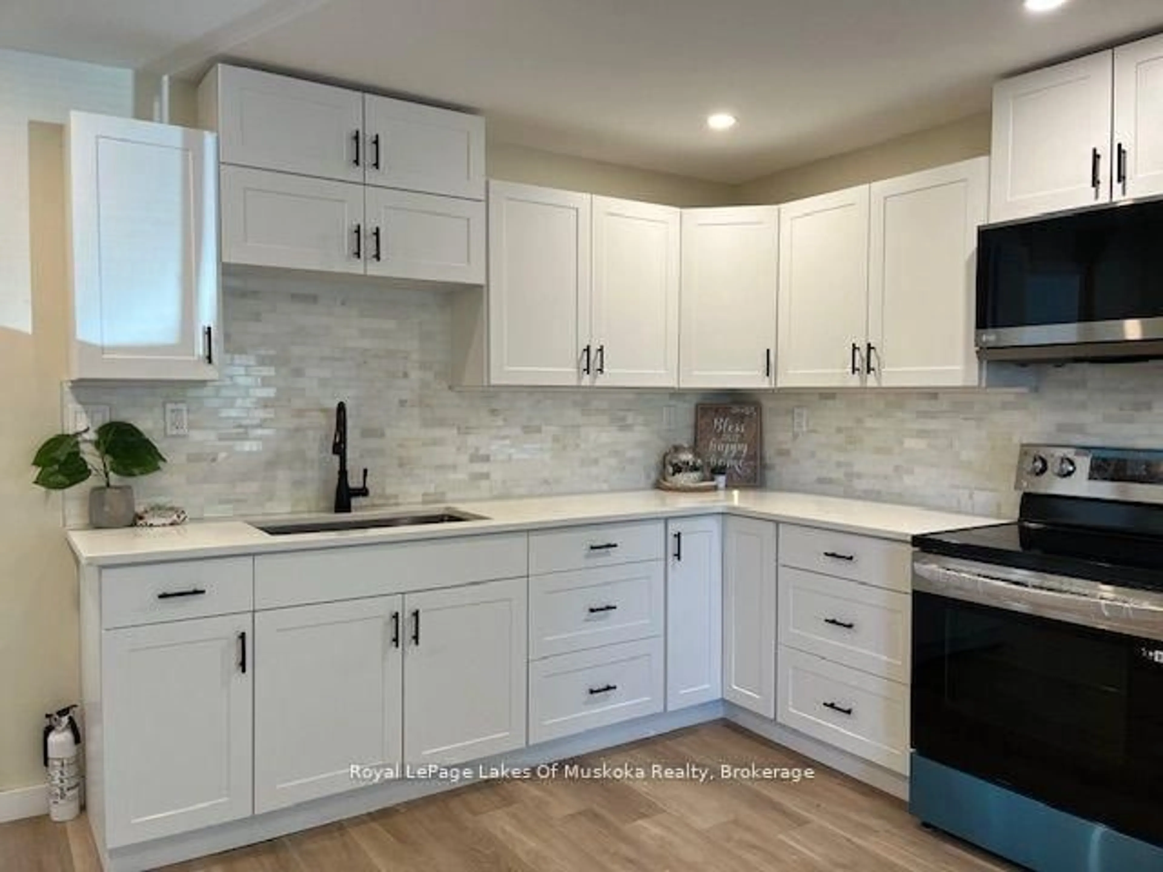 Open concept kitchen, ceramic/tile floor for 36 Ottawa Ave, South River Ontario P0A 1X0
