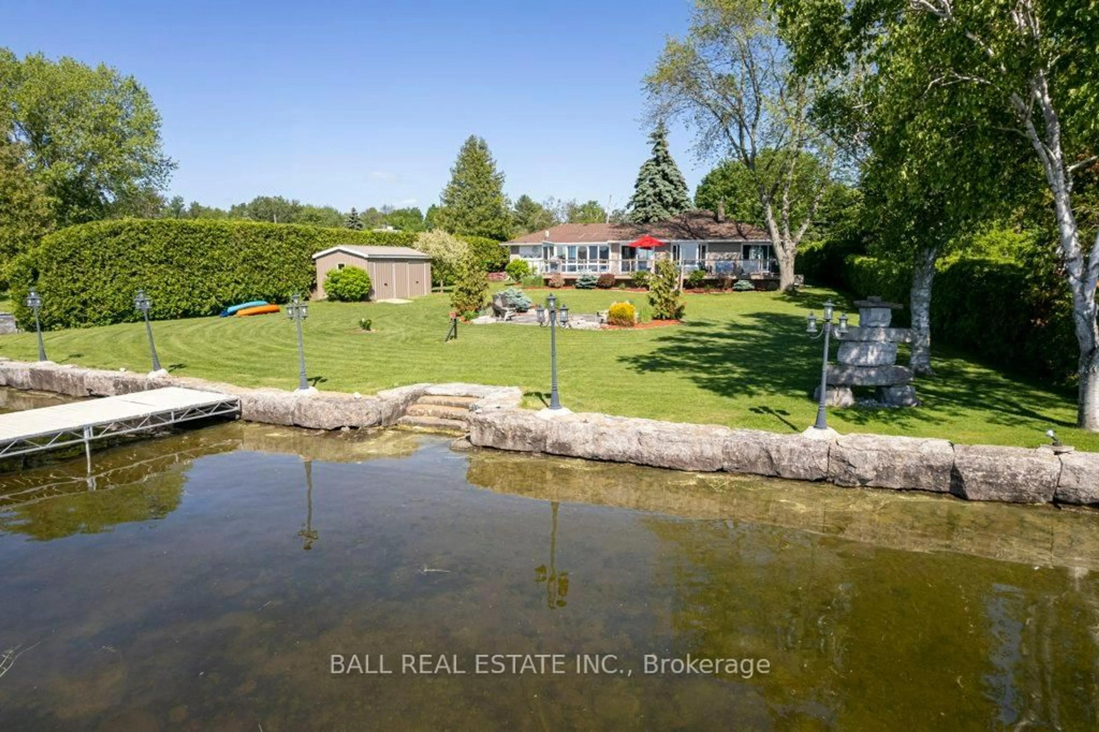 A pic from outside/outdoor area/front of a property/back of a property/a pic from drone, water/lake/river/ocean view for 1484 Hawkswood Dr, Selwyn Ontario K0L 1T0