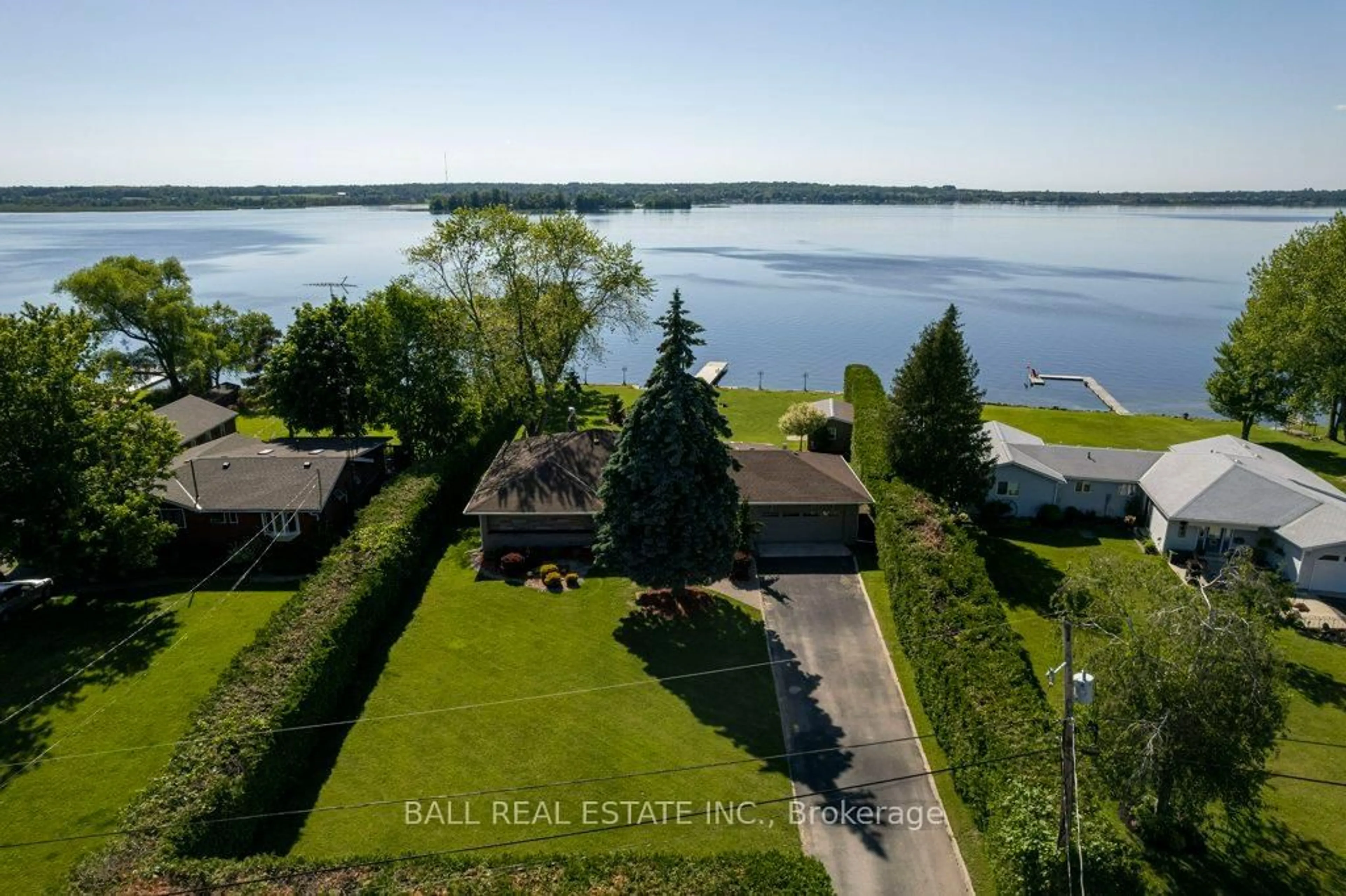 A pic from outside/outdoor area/front of a property/back of a property/a pic from drone, water/lake/river/ocean view for 1484 Hawkswood Dr, Selwyn Ontario K0L 1T0