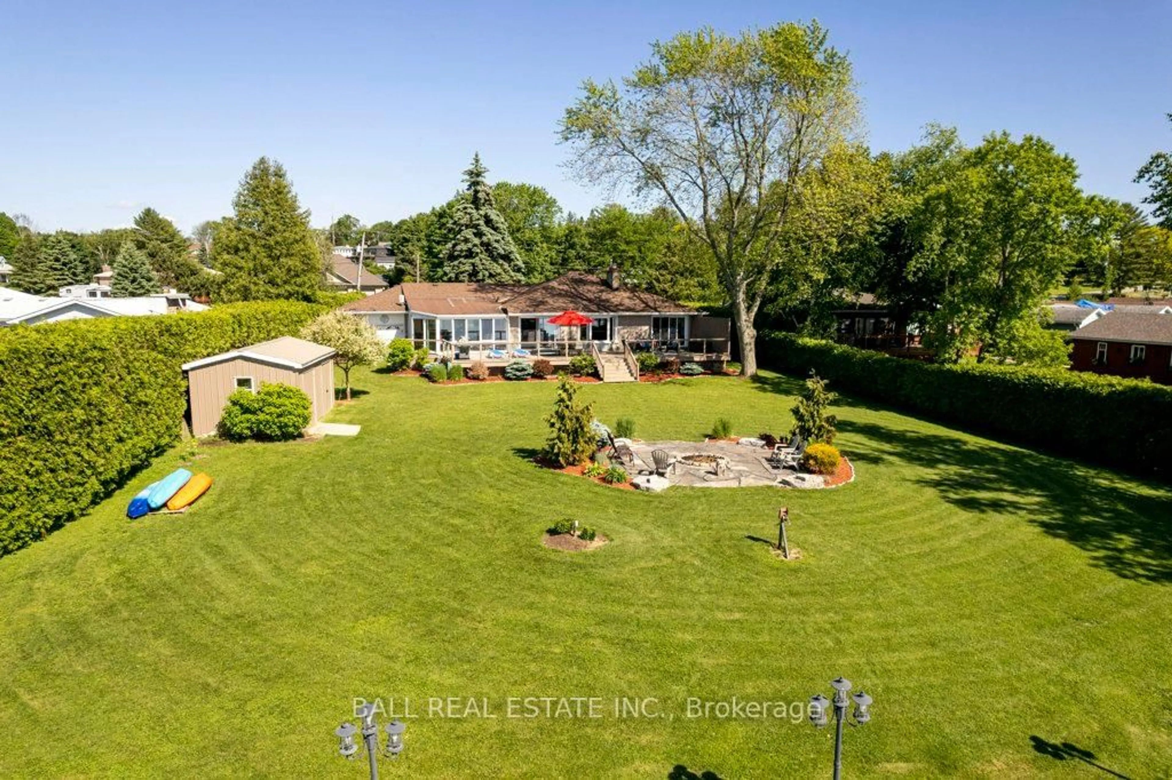 A pic from outside/outdoor area/front of a property/back of a property/a pic from drone, water/lake/river/ocean view for 1484 Hawkswood Dr, Selwyn Ontario K0L 1T0
