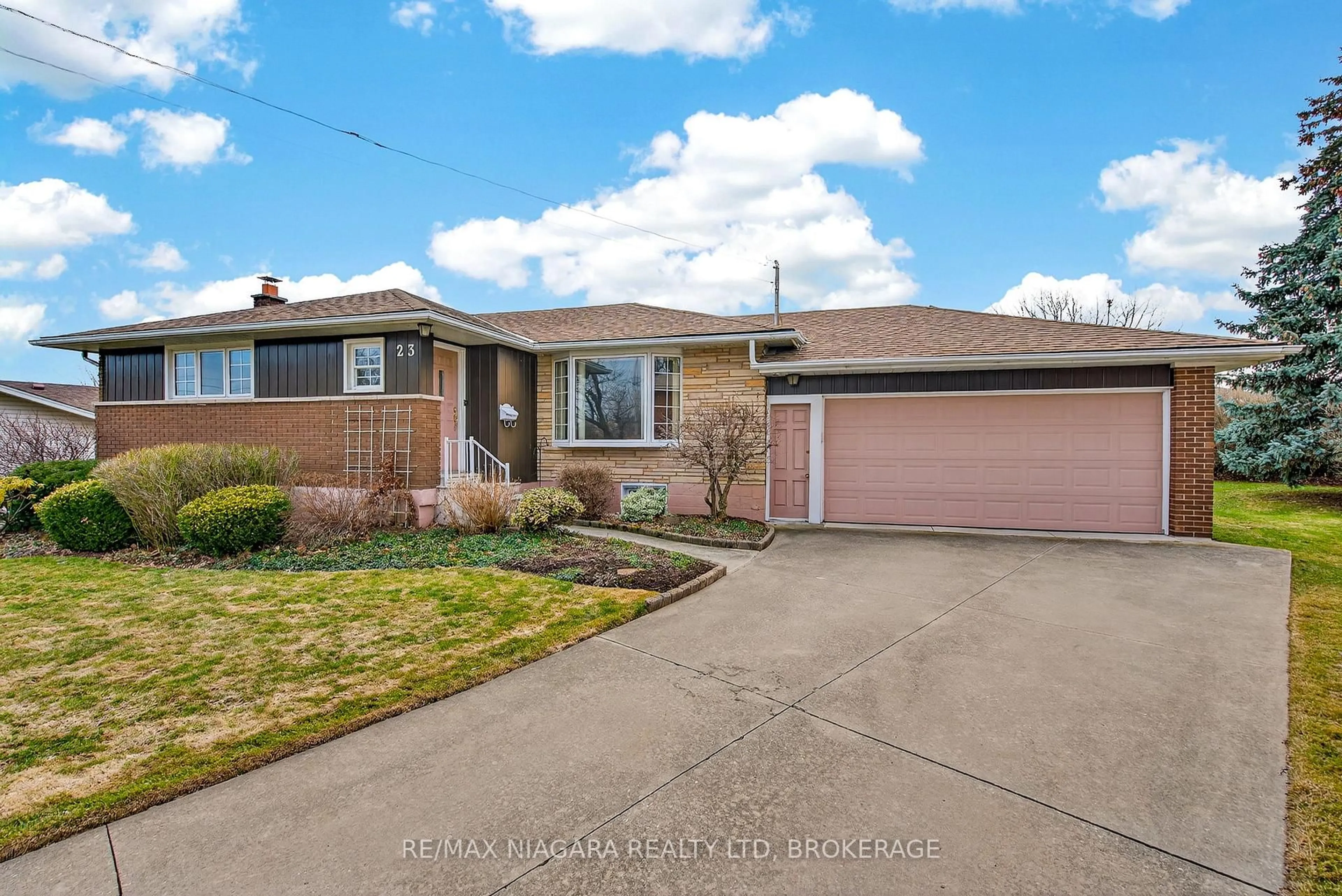 Home with brick exterior material, street for 23 Almond Gdns, Grimsby Ontario L3M 2K2