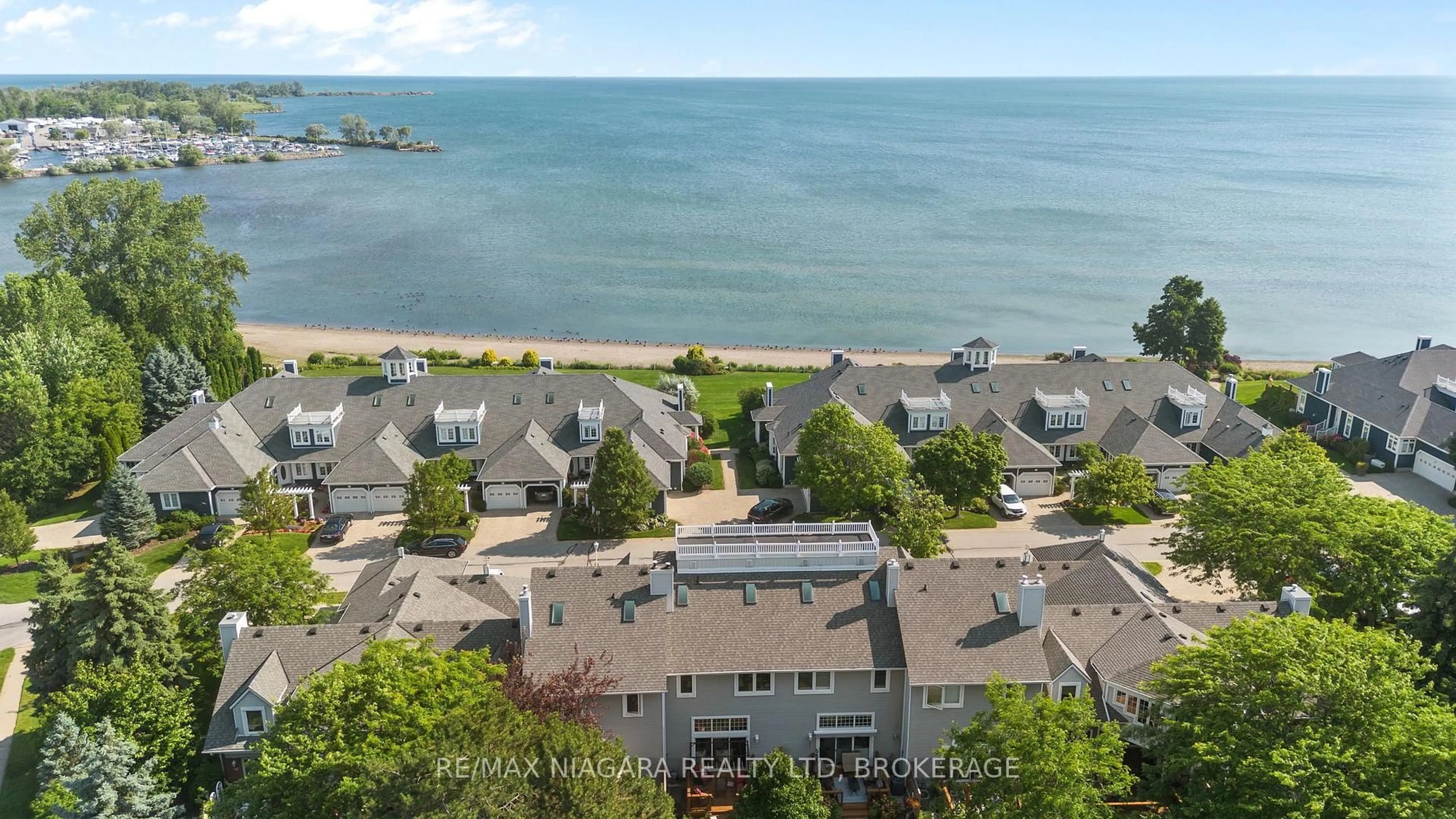 A pic from outside/outdoor area/front of a property/back of a property/a pic from drone, water/lake/river/ocean view for 15 LAKESIDE Dr #41, St. Catharines Ontario L2M 1P3