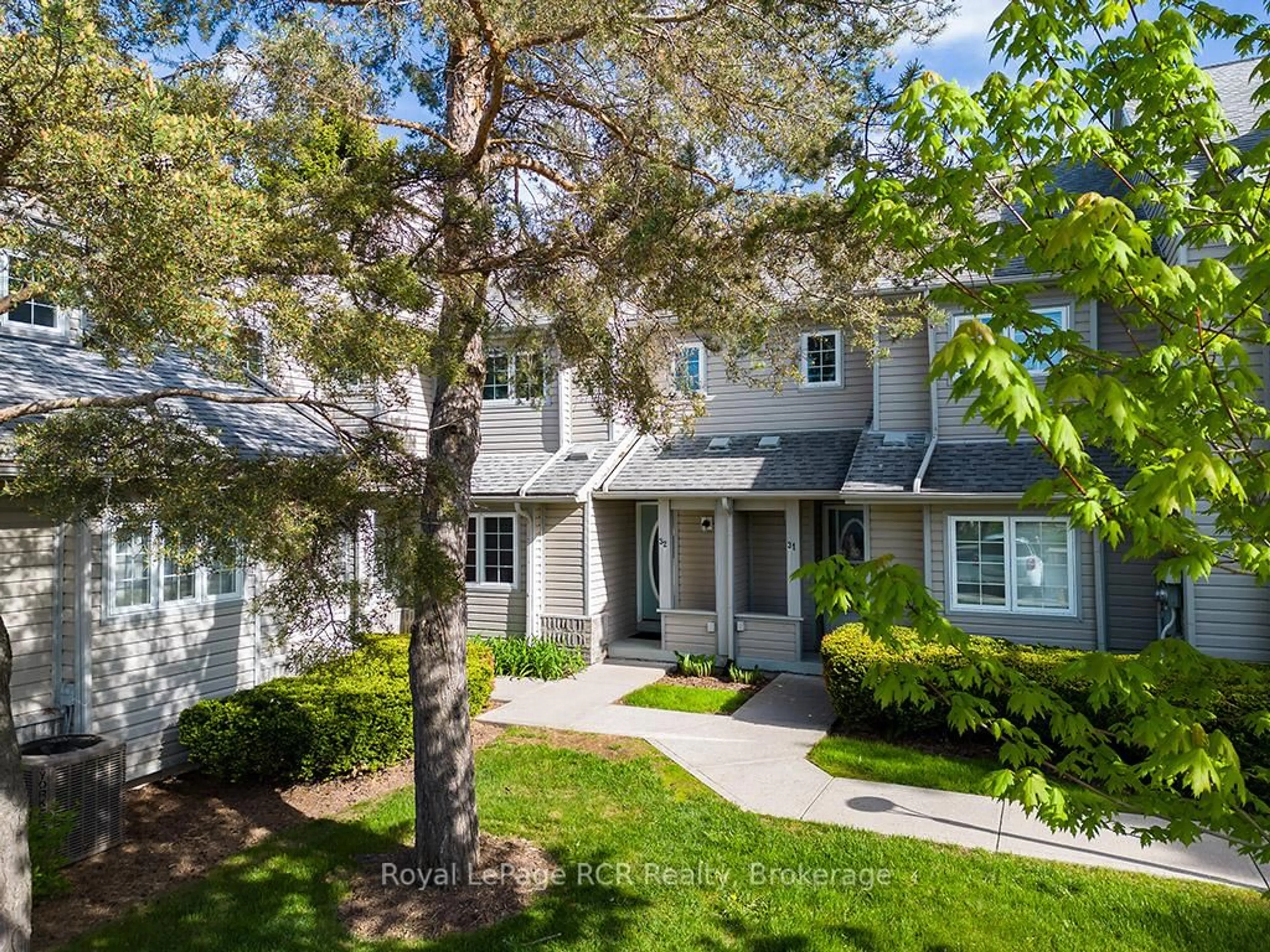 A pic from outside/outdoor area/front of a property/back of a property/a pic from drone, street for 162 Settlers Way #Unit #32, Blue Mountains Ontario L9Y 0M4