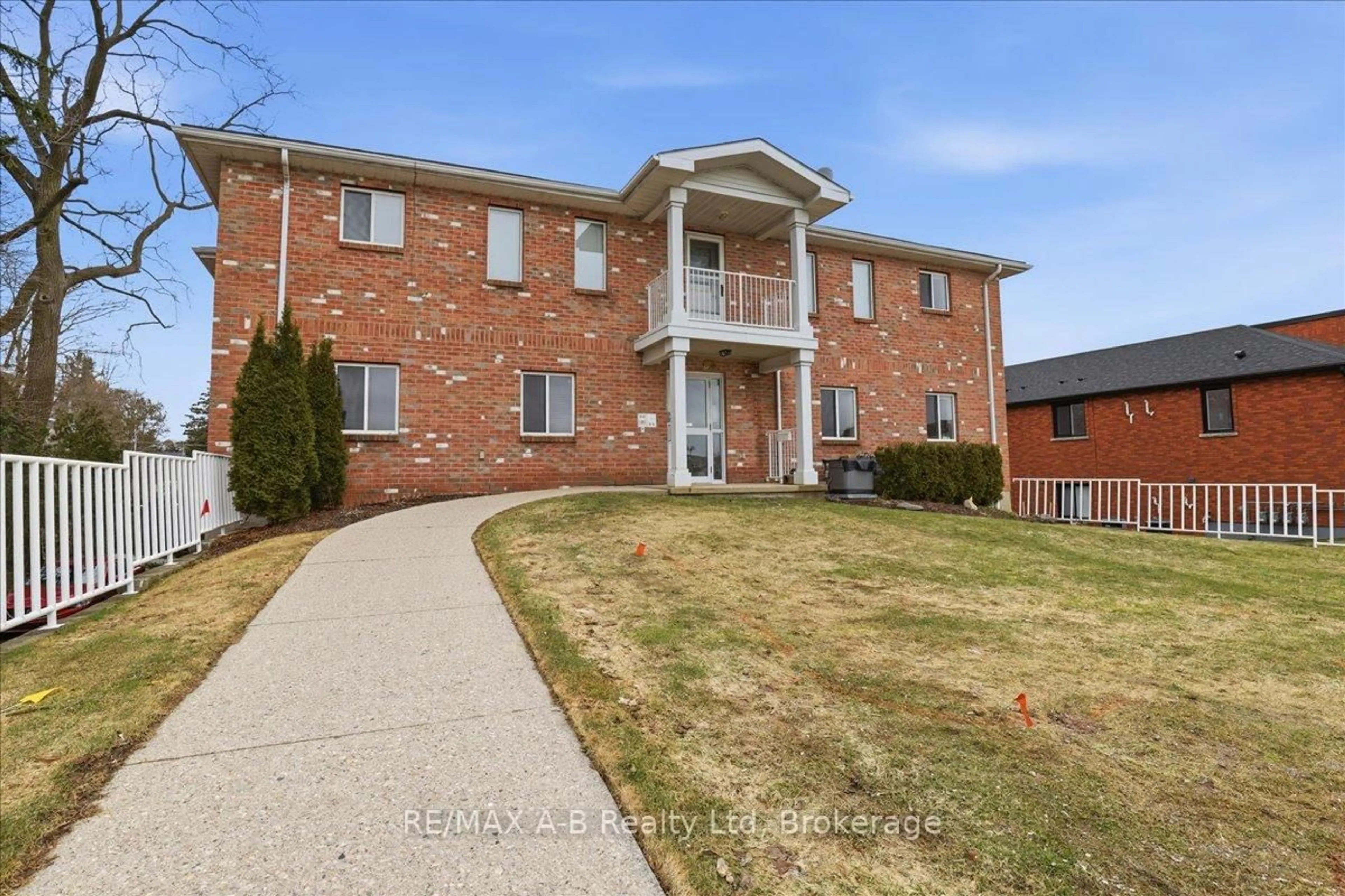 Home with brick exterior material, street for 84 Church St #1, Stratford Ontario N5A 2R2