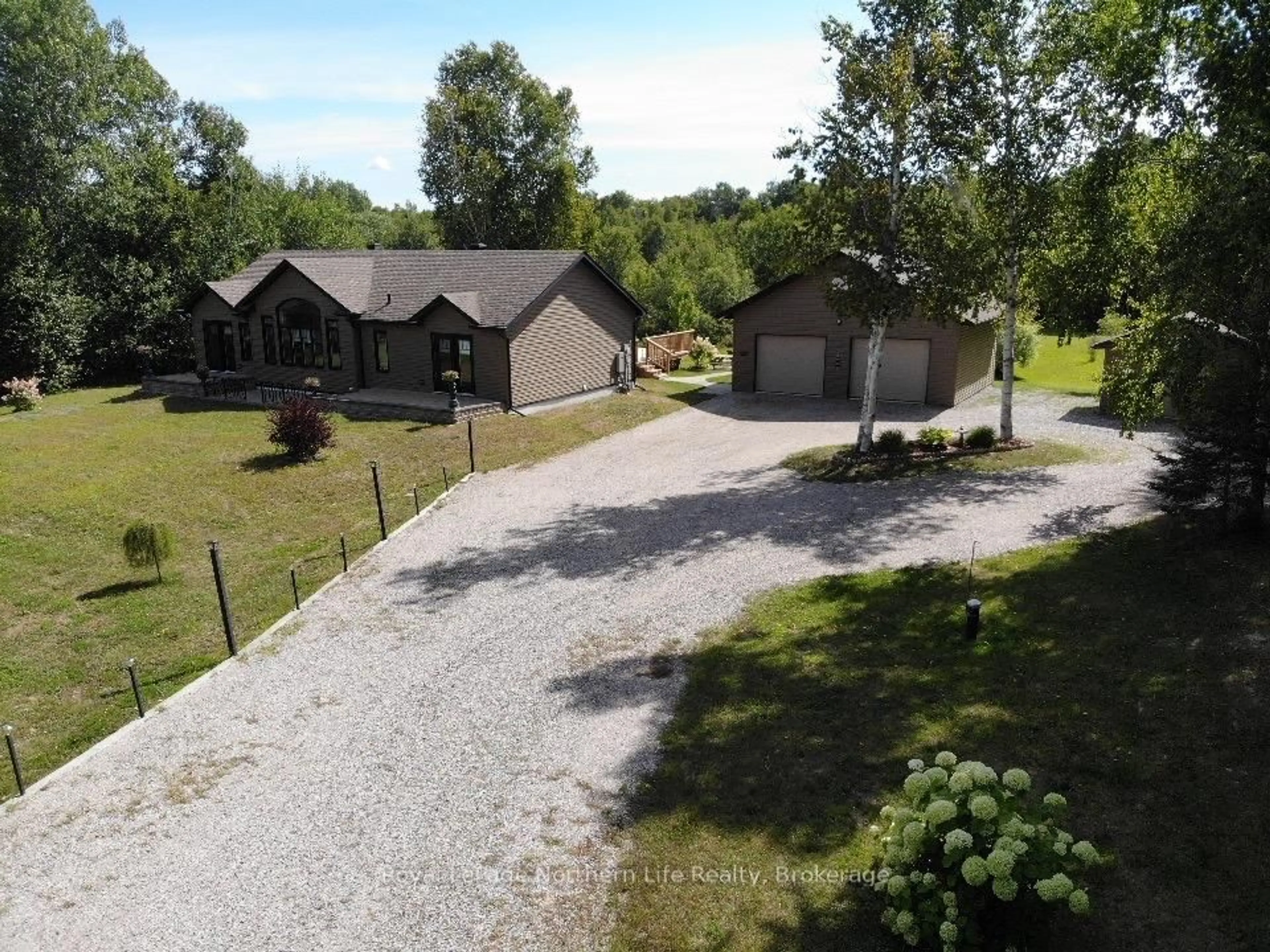A pic from outside/outdoor area/front of a property/back of a property/a pic from drone, unknown for 1033 Evansville Dr, West Nipissing Ontario P2B 2K6