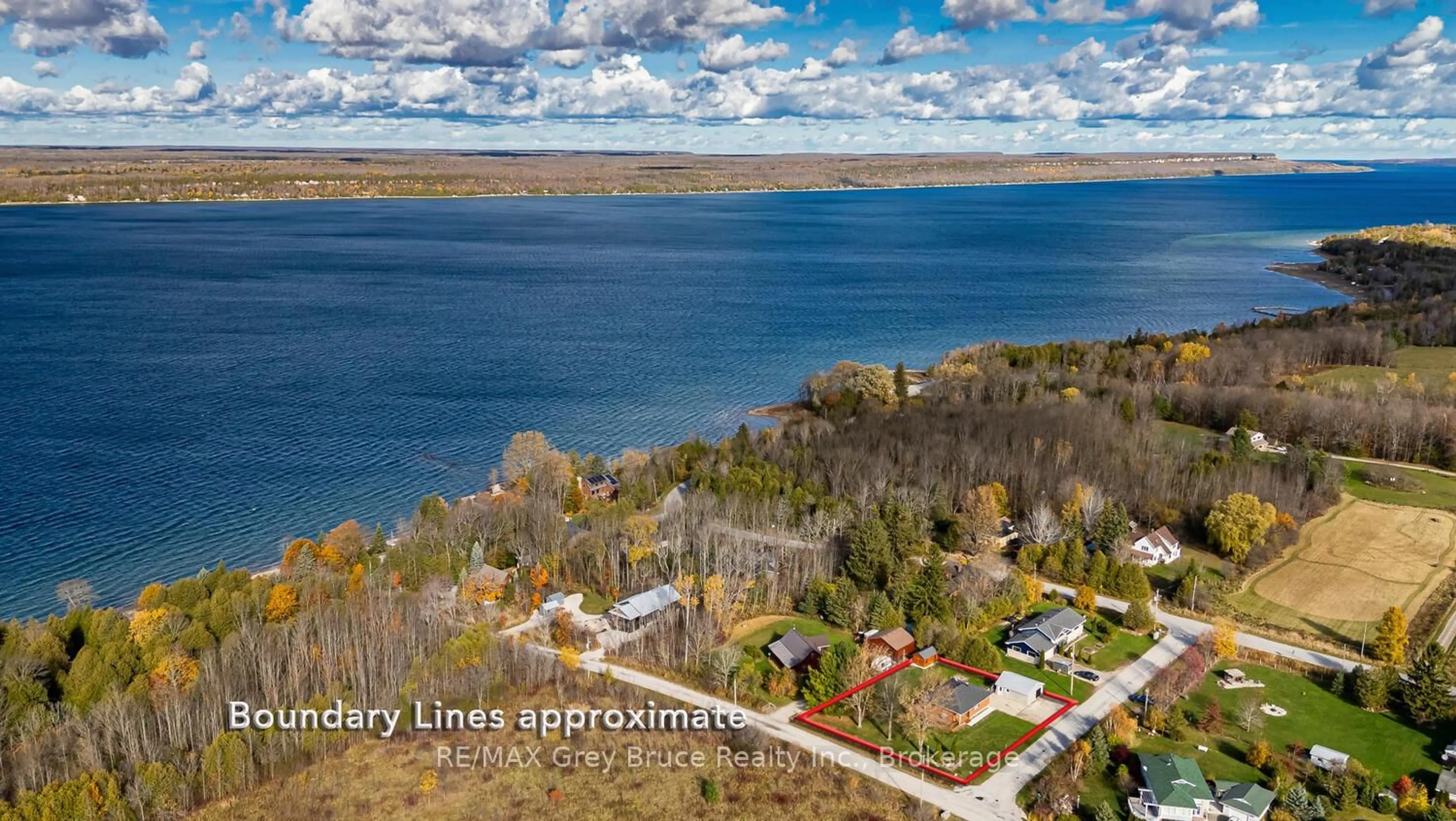 A pic from outside/outdoor area/front of a property/back of a property/a pic from drone, water/lake/river/ocean view for 105 John St, Georgian Bluffs Ontario N0H 2T0