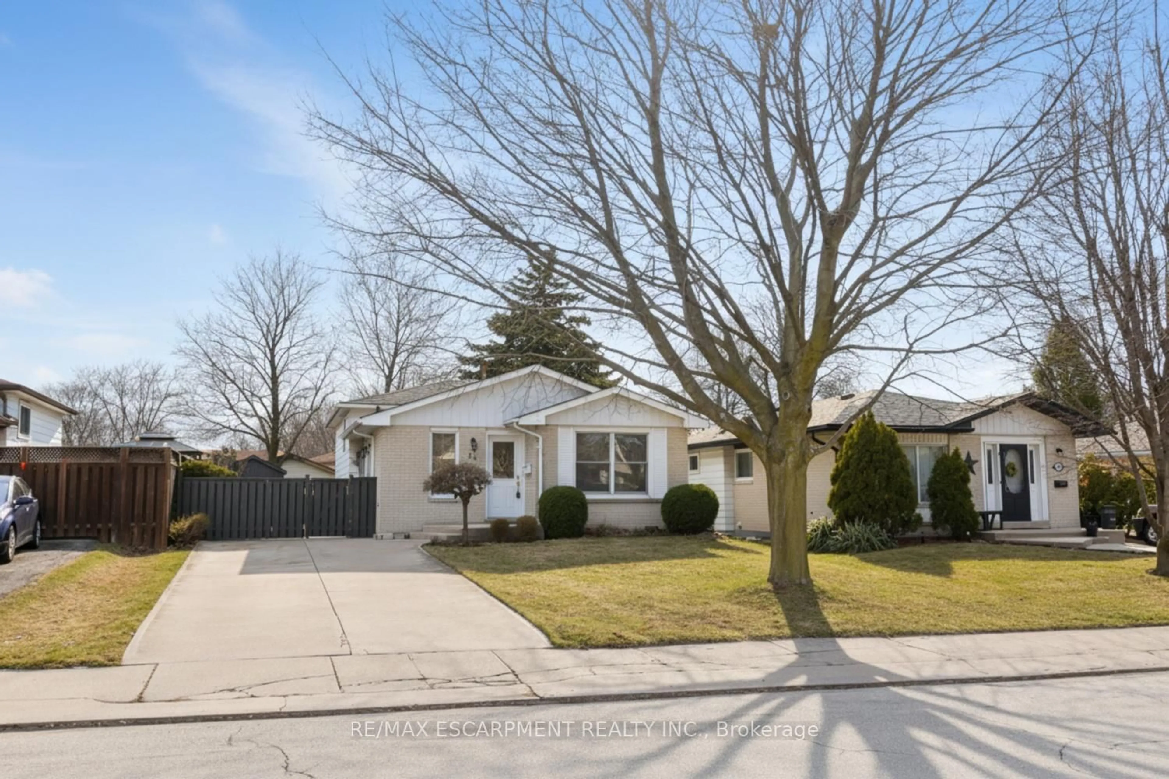 Home with vinyl exterior material, street for 24 Grenoble Rd, Hamilton Ontario L9C 6K6