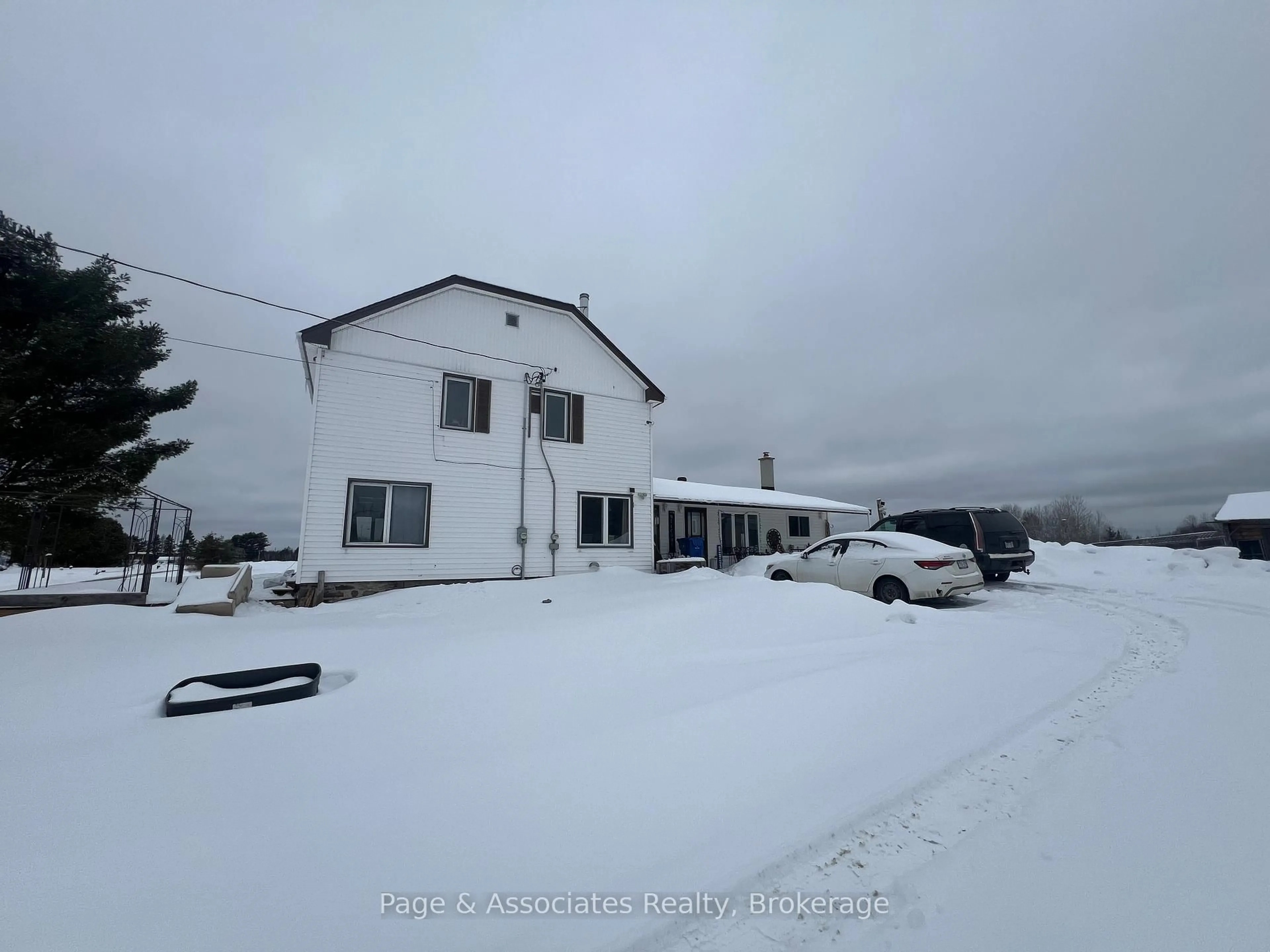 A pic from outside/outdoor area/front of a property/back of a property/a pic from drone, mountain view for 389 Larocque St, West Nipissing Ontario P0H 1M0