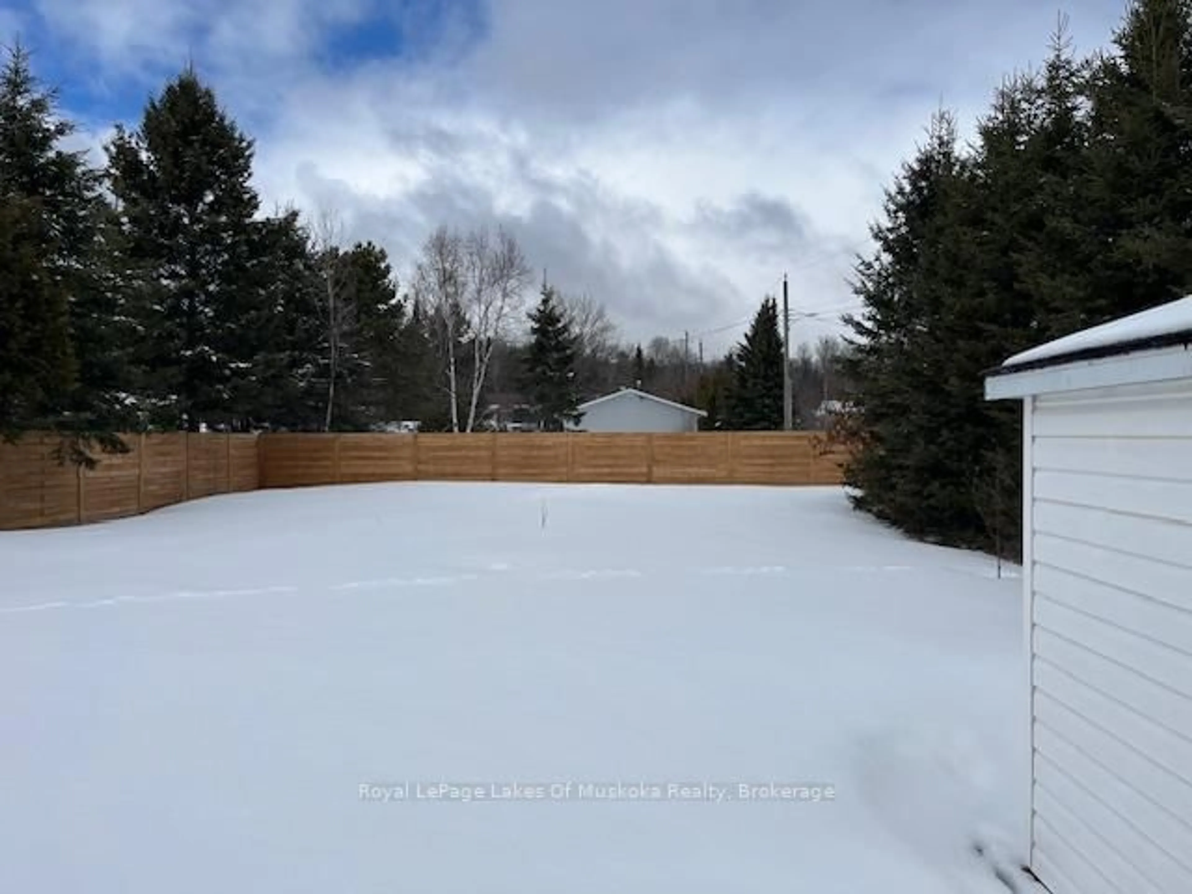 A pic from outside/outdoor area/front of a property/back of a property/a pic from drone, water/lake/river/ocean view for 27 Lincoln Ave, South River Ontario P0A 1X0