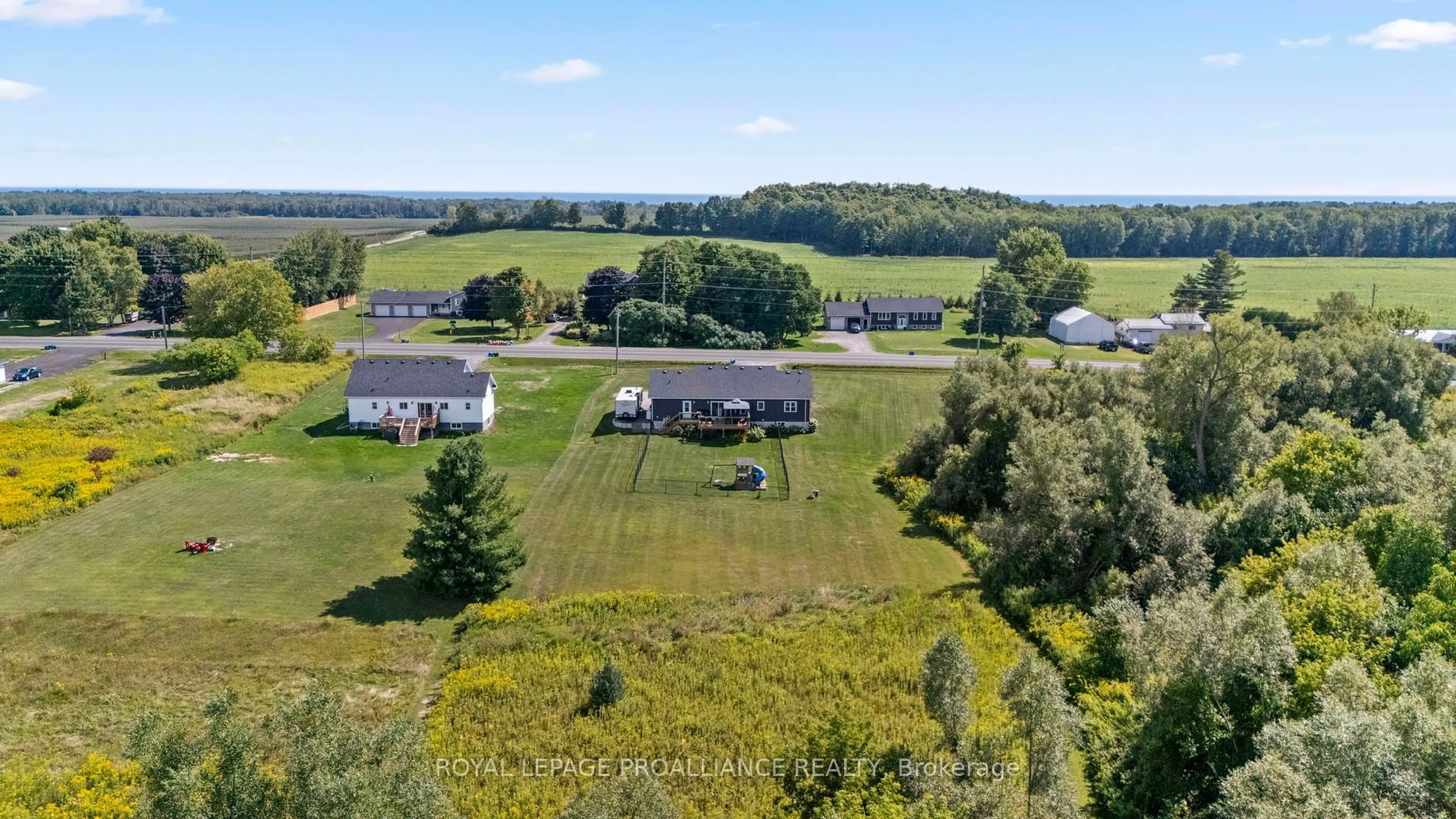 A pic from outside/outdoor area/front of a property/back of a property/a pic from drone, water/lake/river/ocean view for 11530 County Rd 2, Alnwick/Haldimand Ontario K0K 2G0