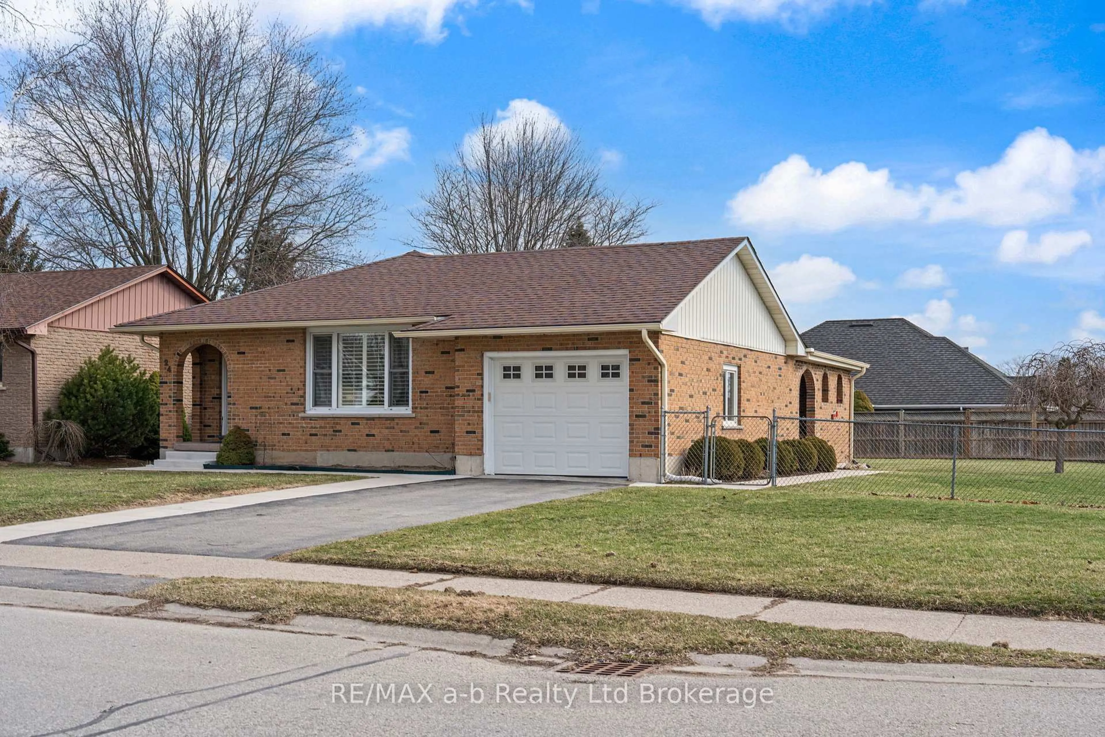 Home with brick exterior material, street for 24 DENRICH Ave, Tillsonburg Ontario N4G 4W2