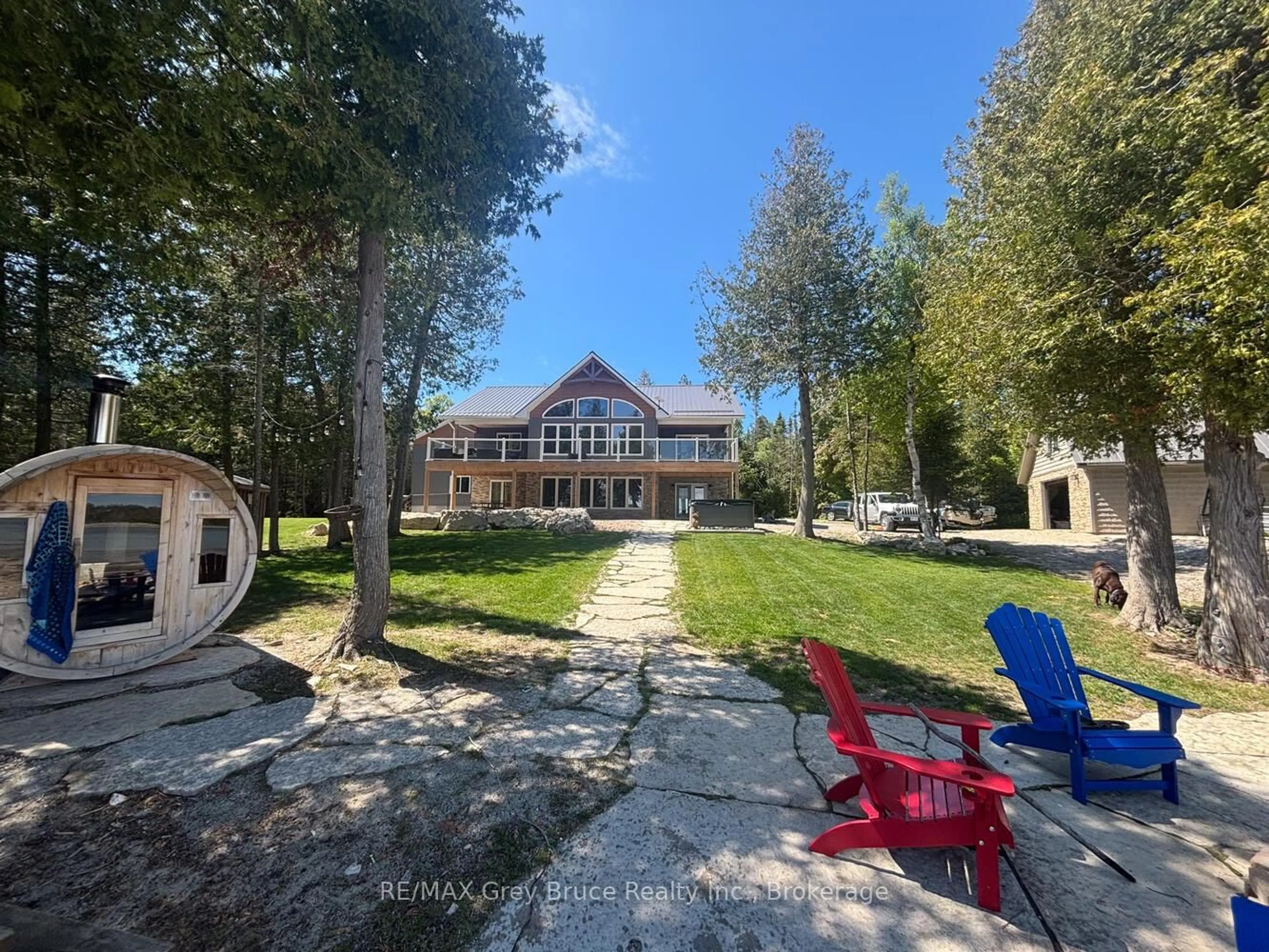 A pic from outside/outdoor area/front of a property/back of a property/a pic from drone, water/lake/river/ocean view for 87 Silverside Point Rd, Northern Bruce Peninsula Ontario N0H 1Z0