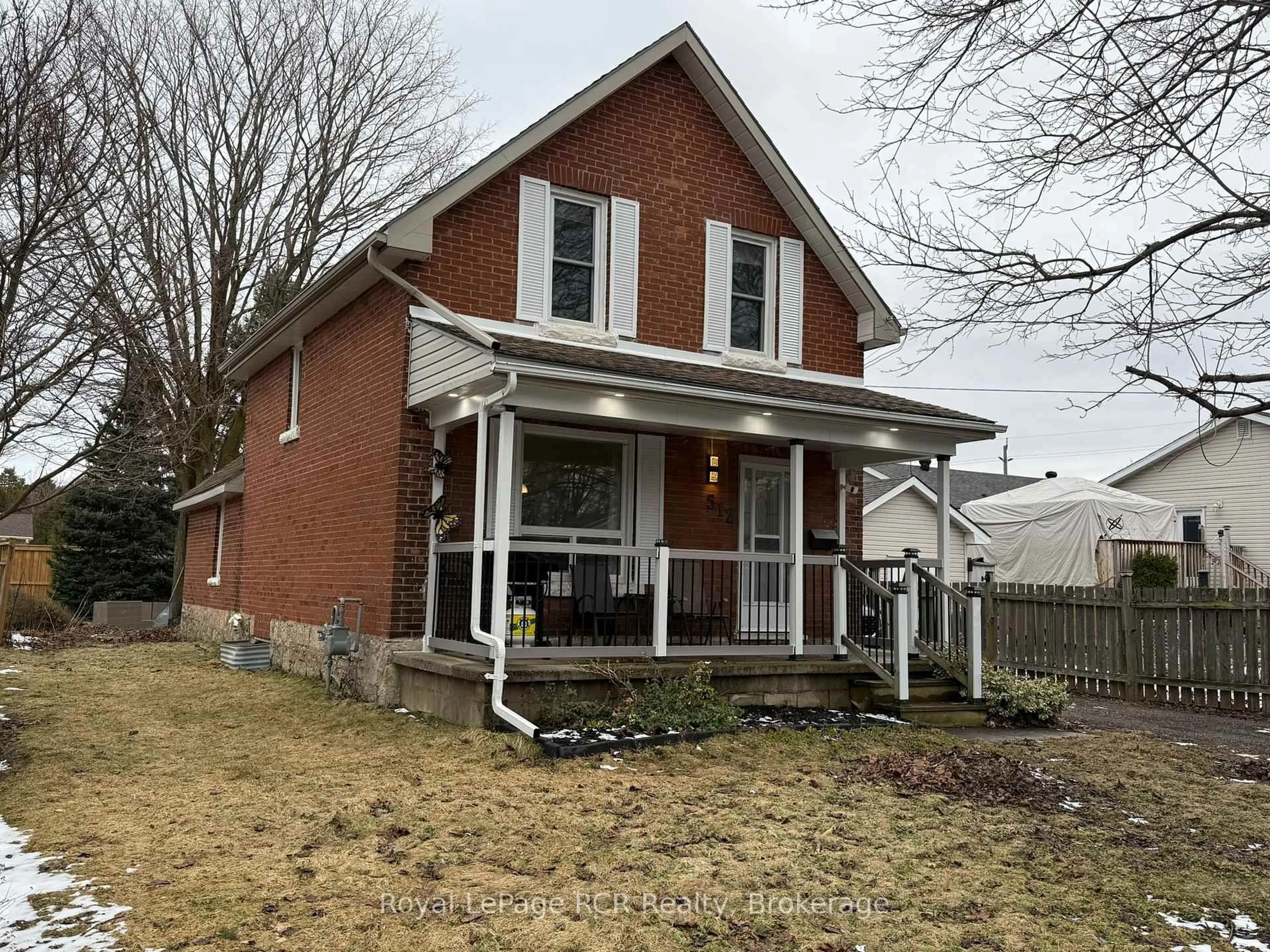 Home with brick exterior material, street for 512 18th St, Owen Sound Ontario N4K 2A7