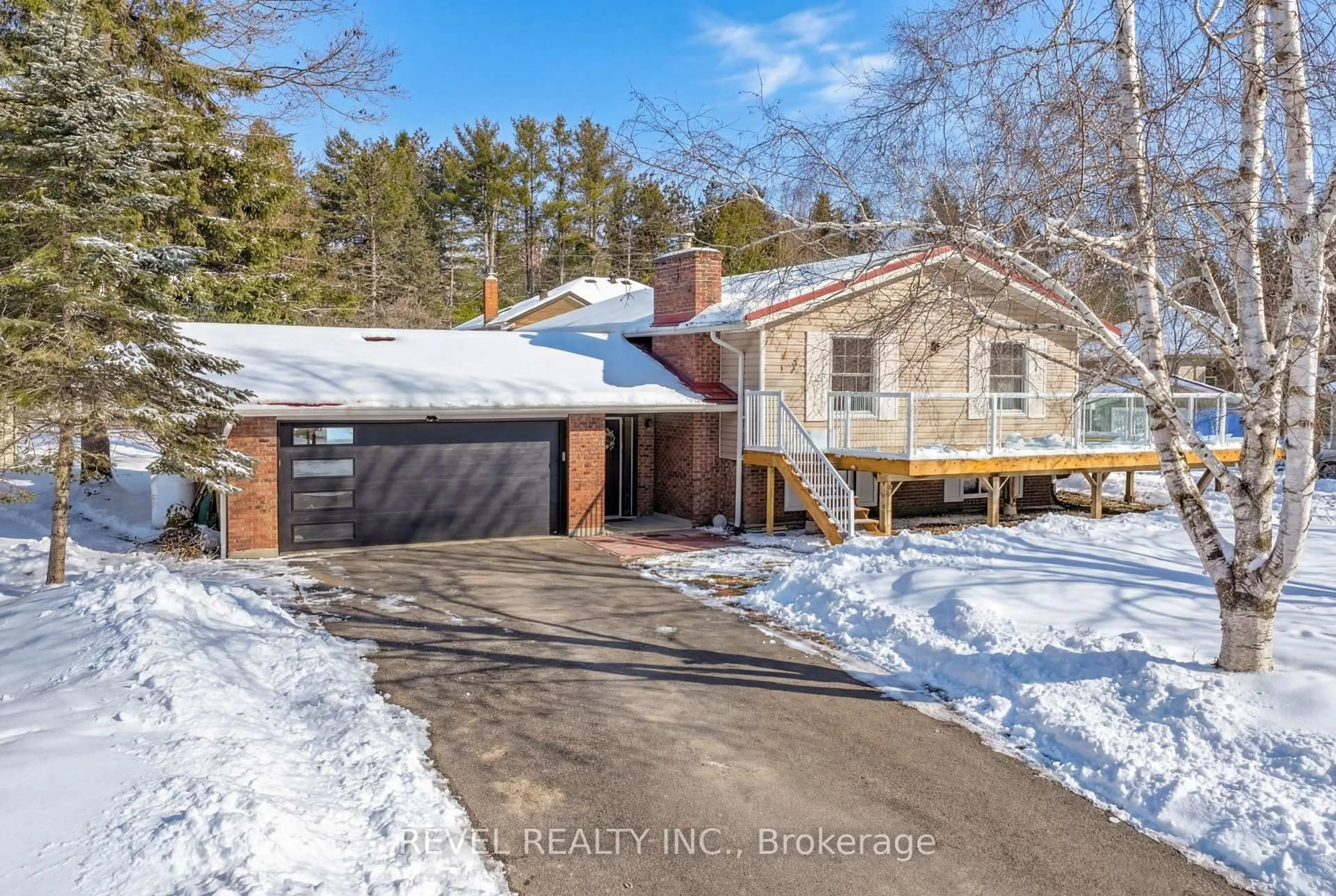 A pic from outside/outdoor area/front of a property/back of a property/a pic from drone, street for 13 Pirates Glen Dr, Trent Lakes Ontario K0M 1A0
