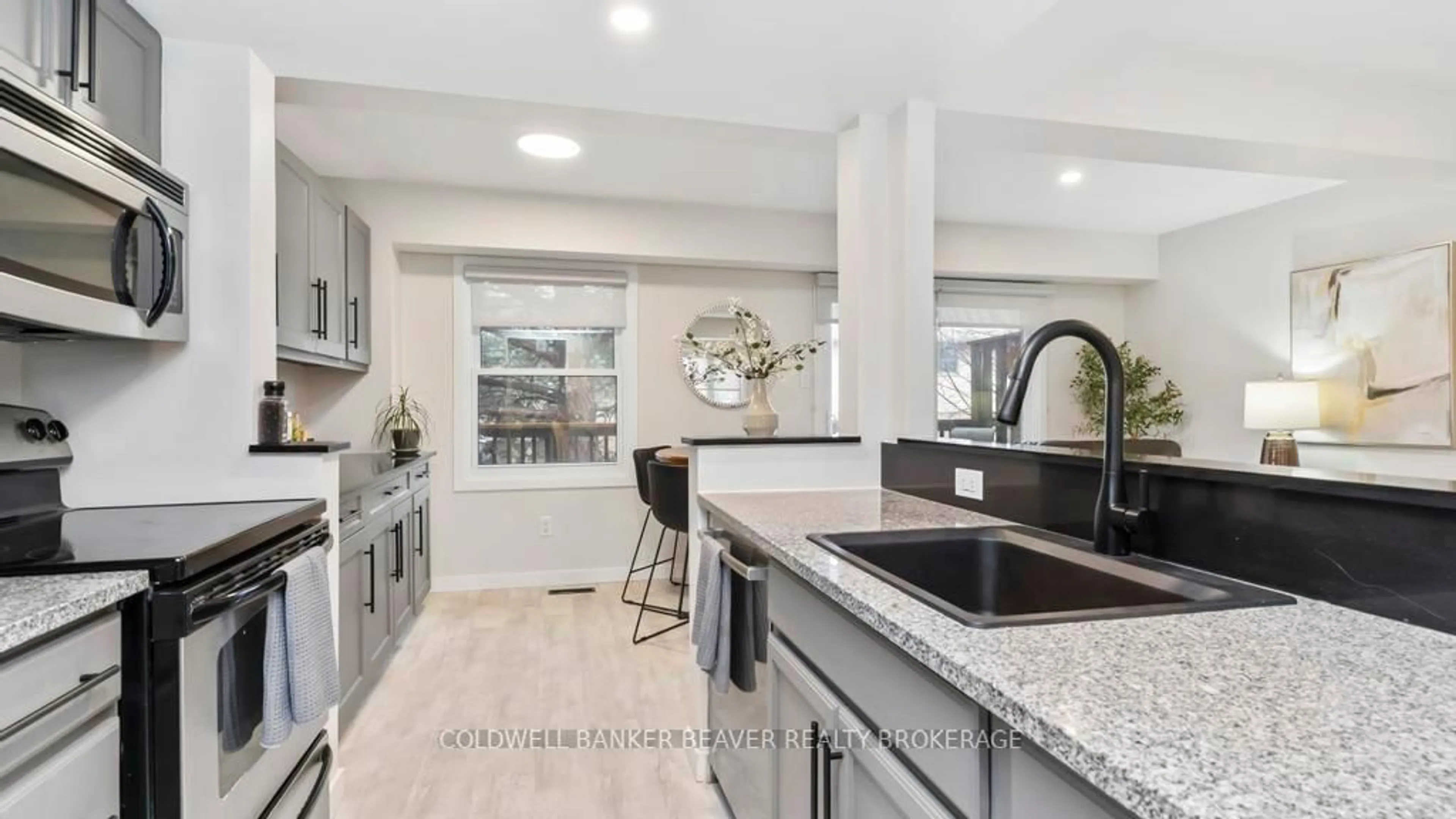 Open concept kitchen, ceramic/tile floor for 295 Wilkins St #47, London South Ontario N6C 5C1