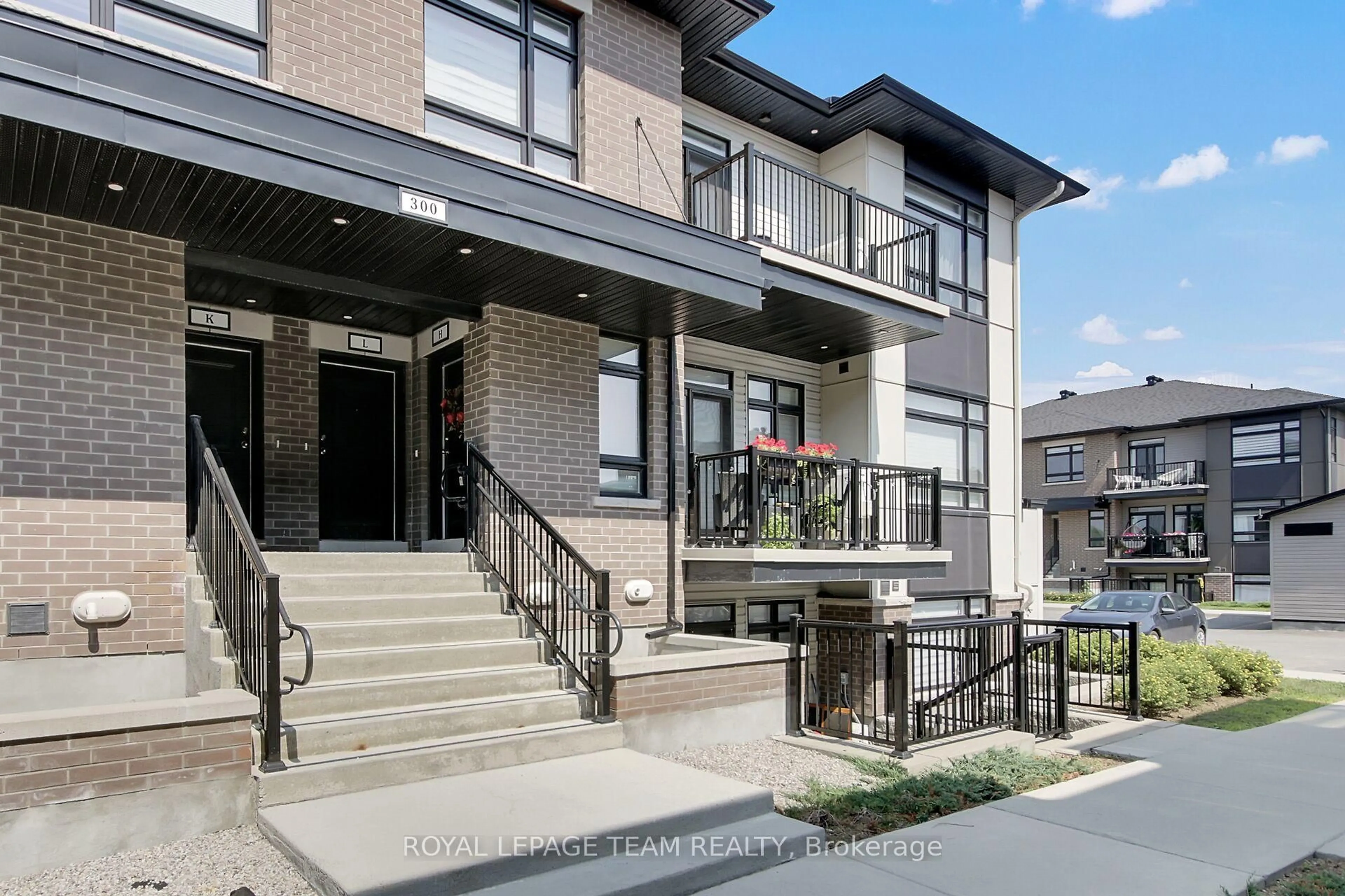 Home with brick exterior material, street for 300 Tulum Cres #H, Ottawa Ontario K2S 2Y4