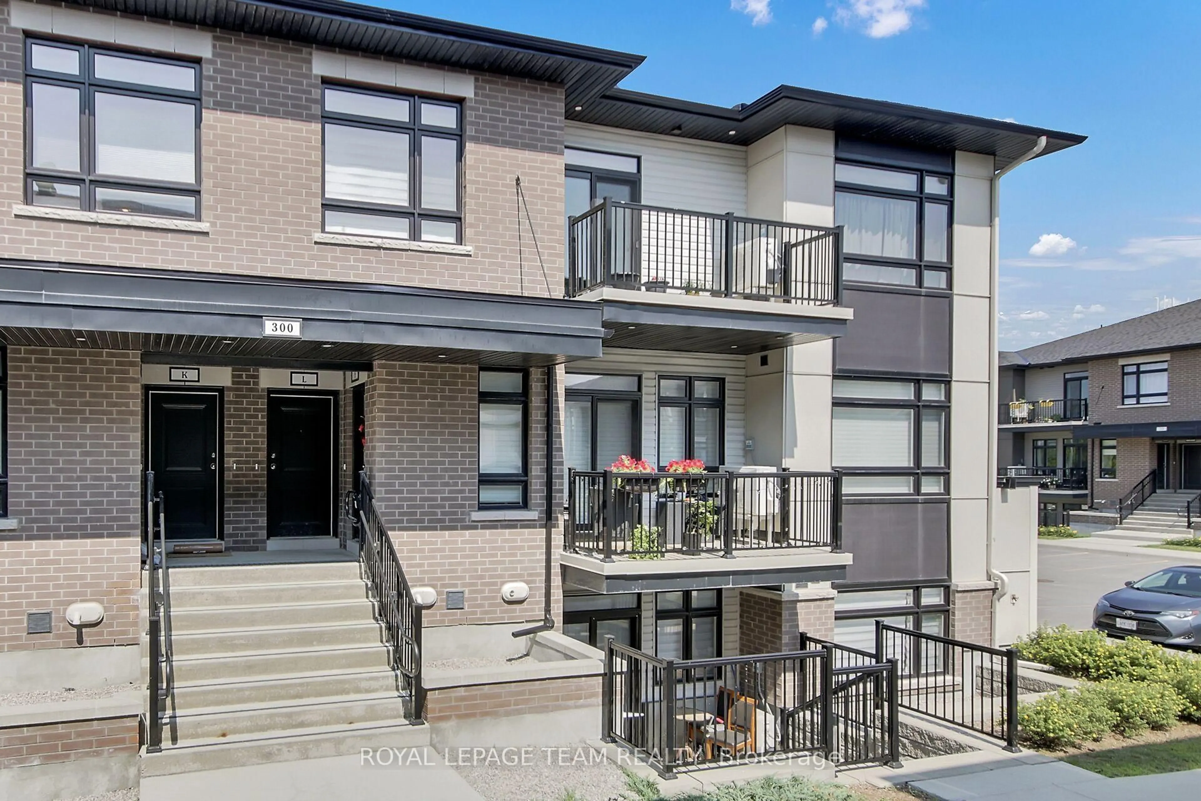 Home with brick exterior material, street for 300 Tulum Cres #H, Ottawa Ontario K2S 2Y4