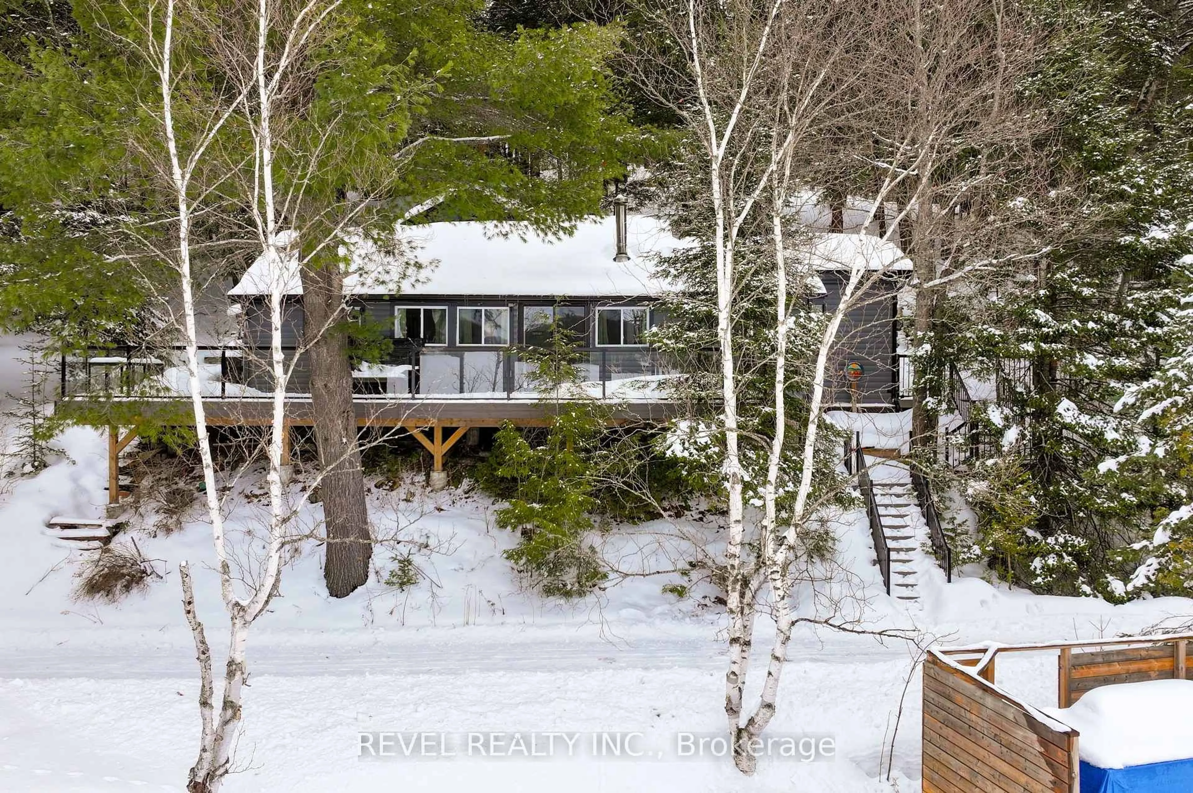 A pic from outside/outdoor area/front of a property/back of a property/a pic from drone, mountain view for 1129 LAKESHORE Rd, Highlands East Ontario K0M 1R0