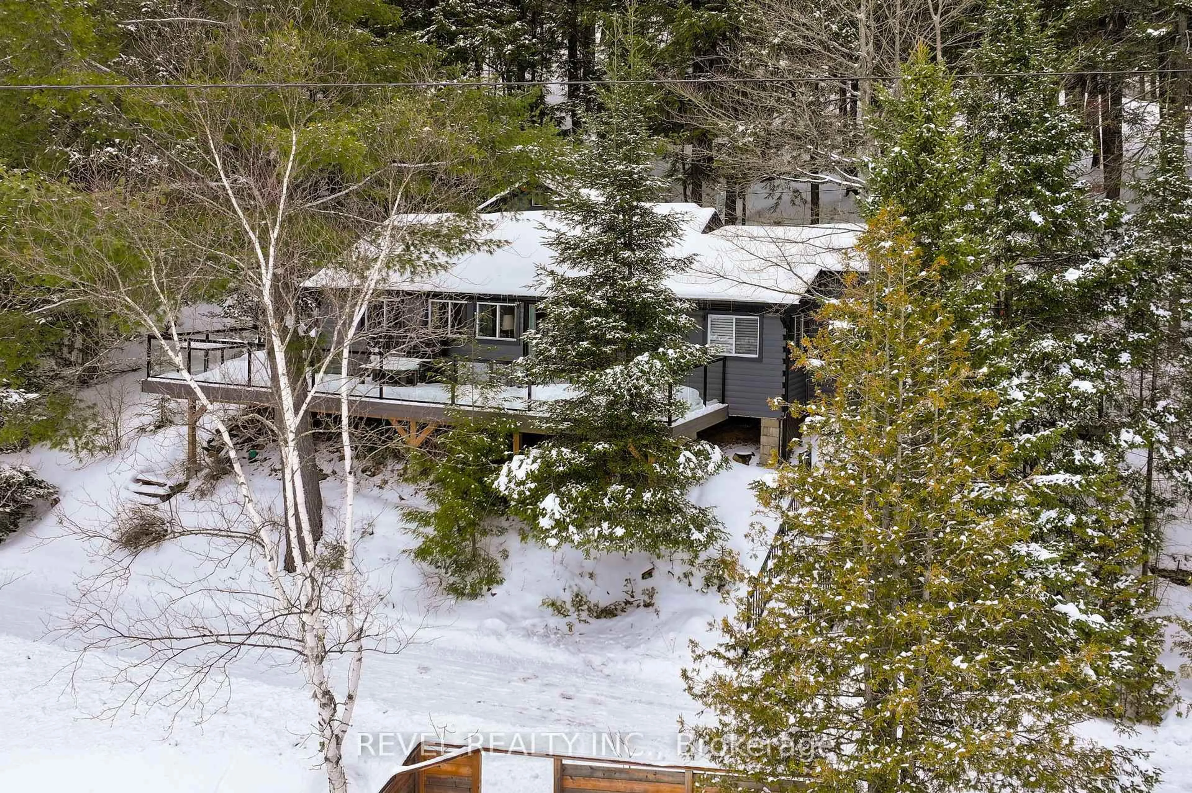 A pic from outside/outdoor area/front of a property/back of a property/a pic from drone, forest/trees view for 1129 LAKESHORE Rd, Highlands East Ontario K0M 1R0