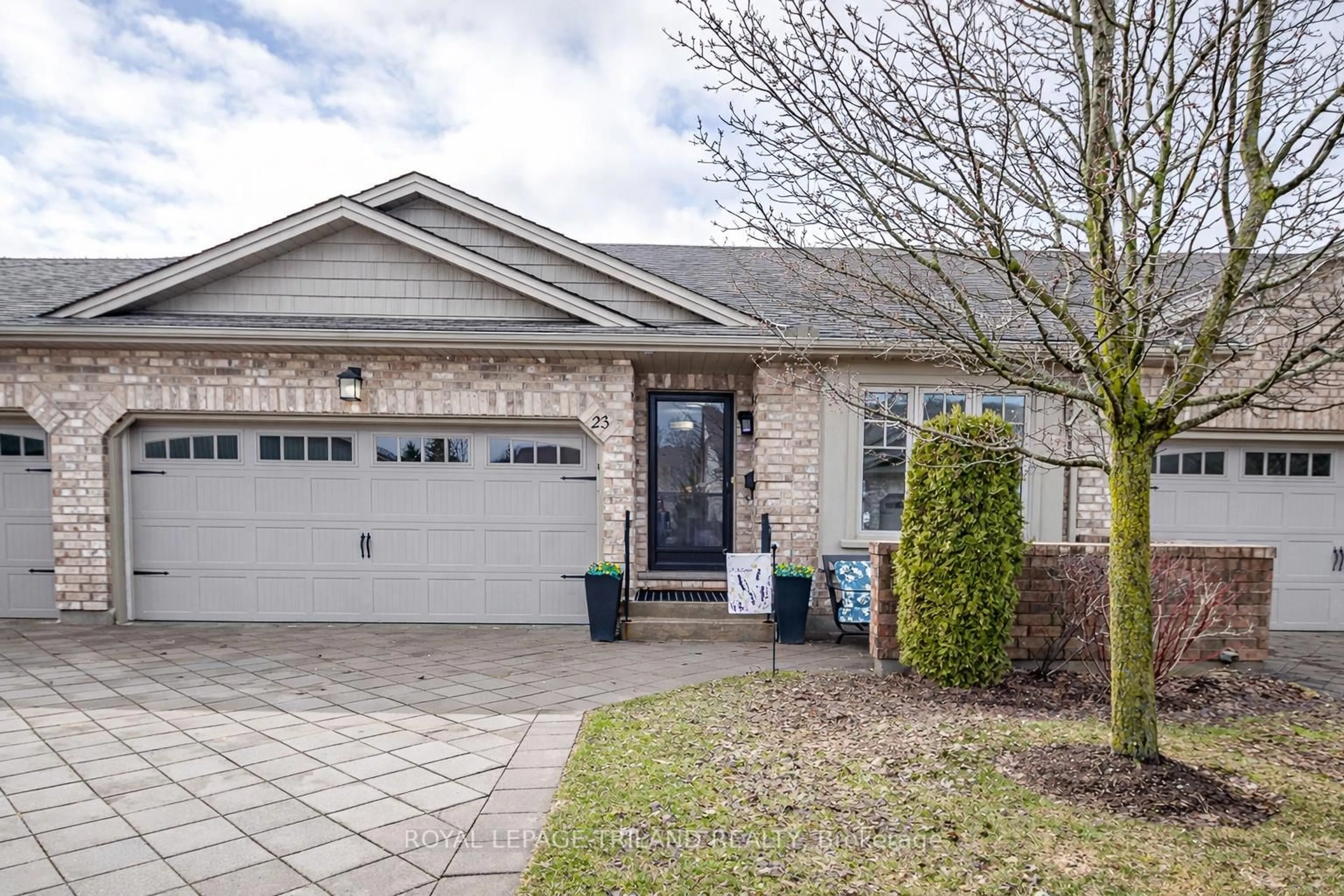 Home with brick exterior material, street for 765 KILLARNEY Rd #23, London North Ontario N5X 0C9