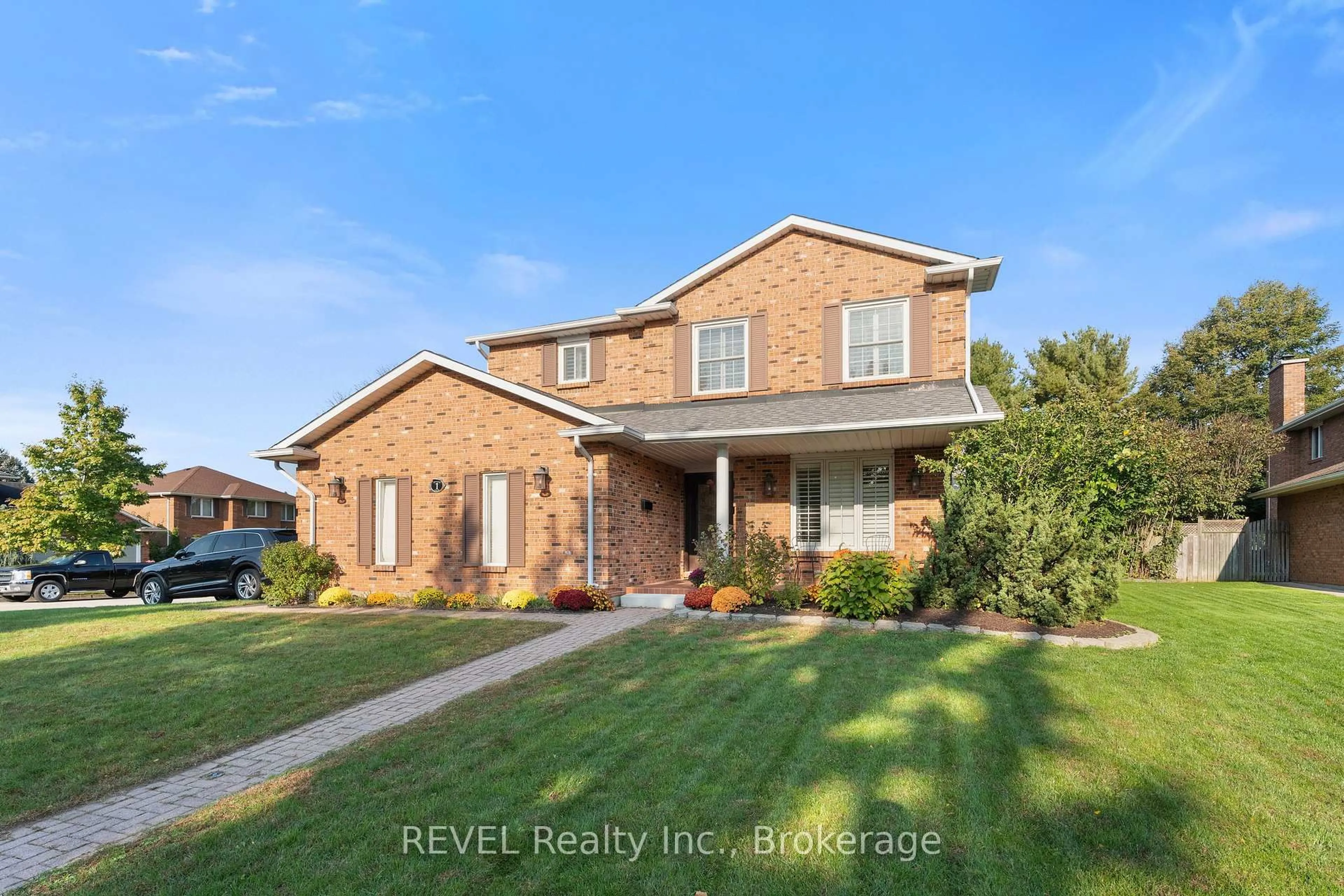 Home with brick exterior material, street for 1 Spartan Crt, St. Catharines Ontario L2N 7M5