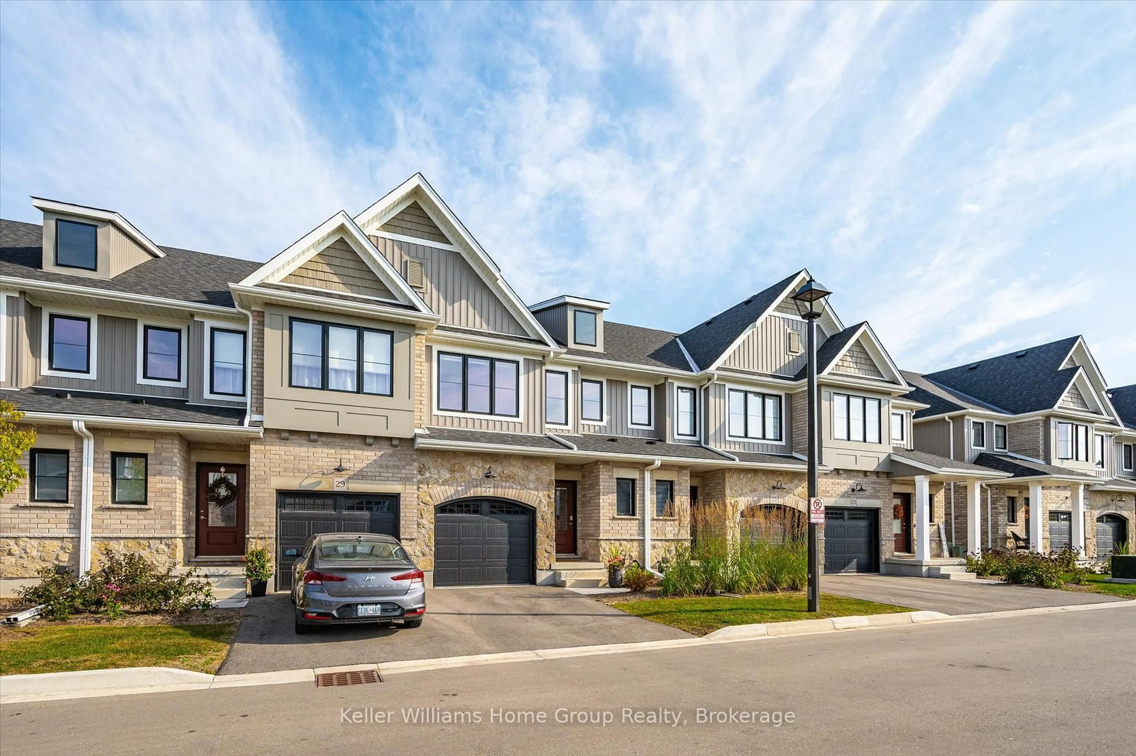 Home with brick exterior material, street for 27 Hedley Lane, Centre Wellington Ontario N0B 1S0