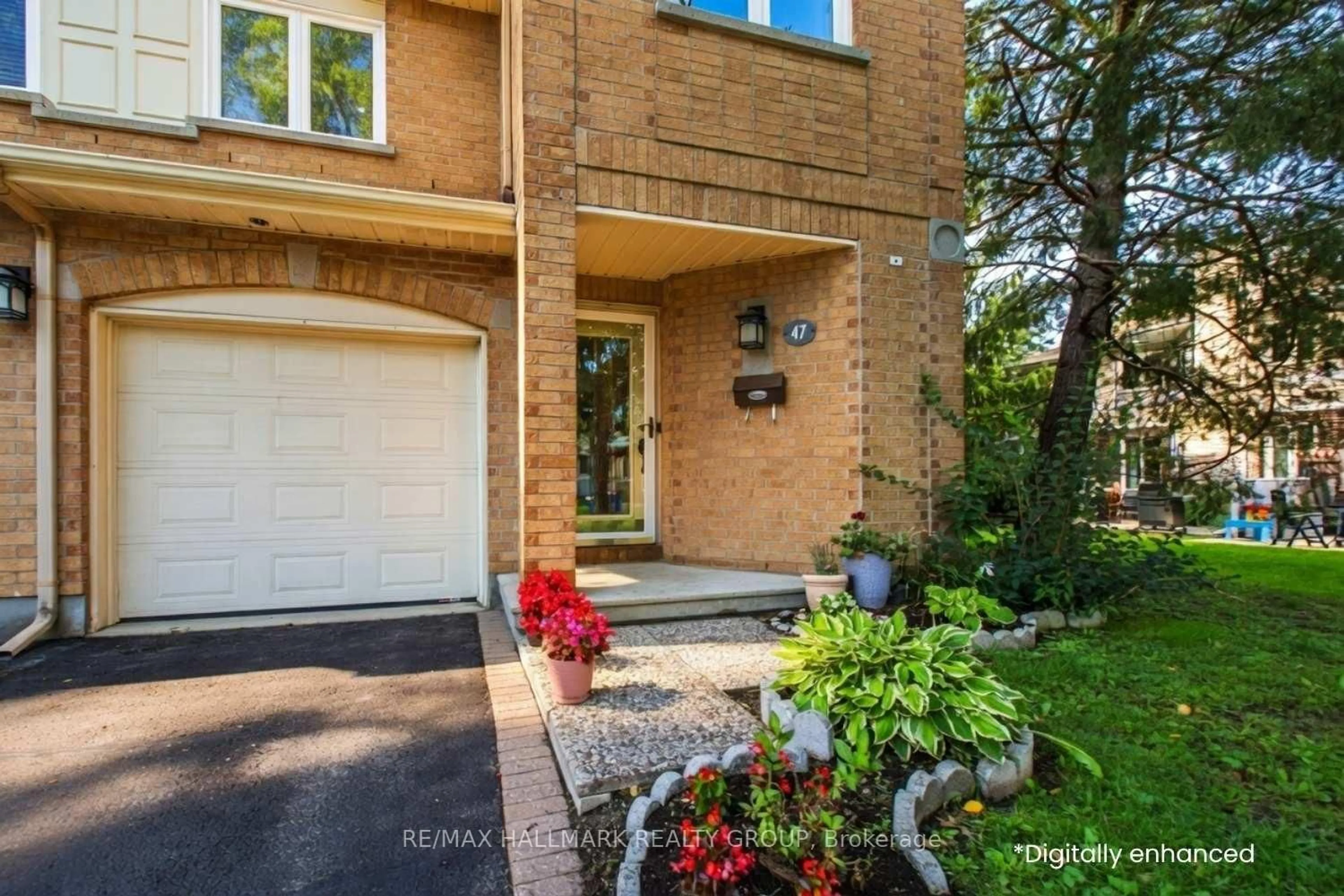 Home with brick exterior material, street for 47 Grandcourt Dr, Ottawa Ontario K2G 5W9