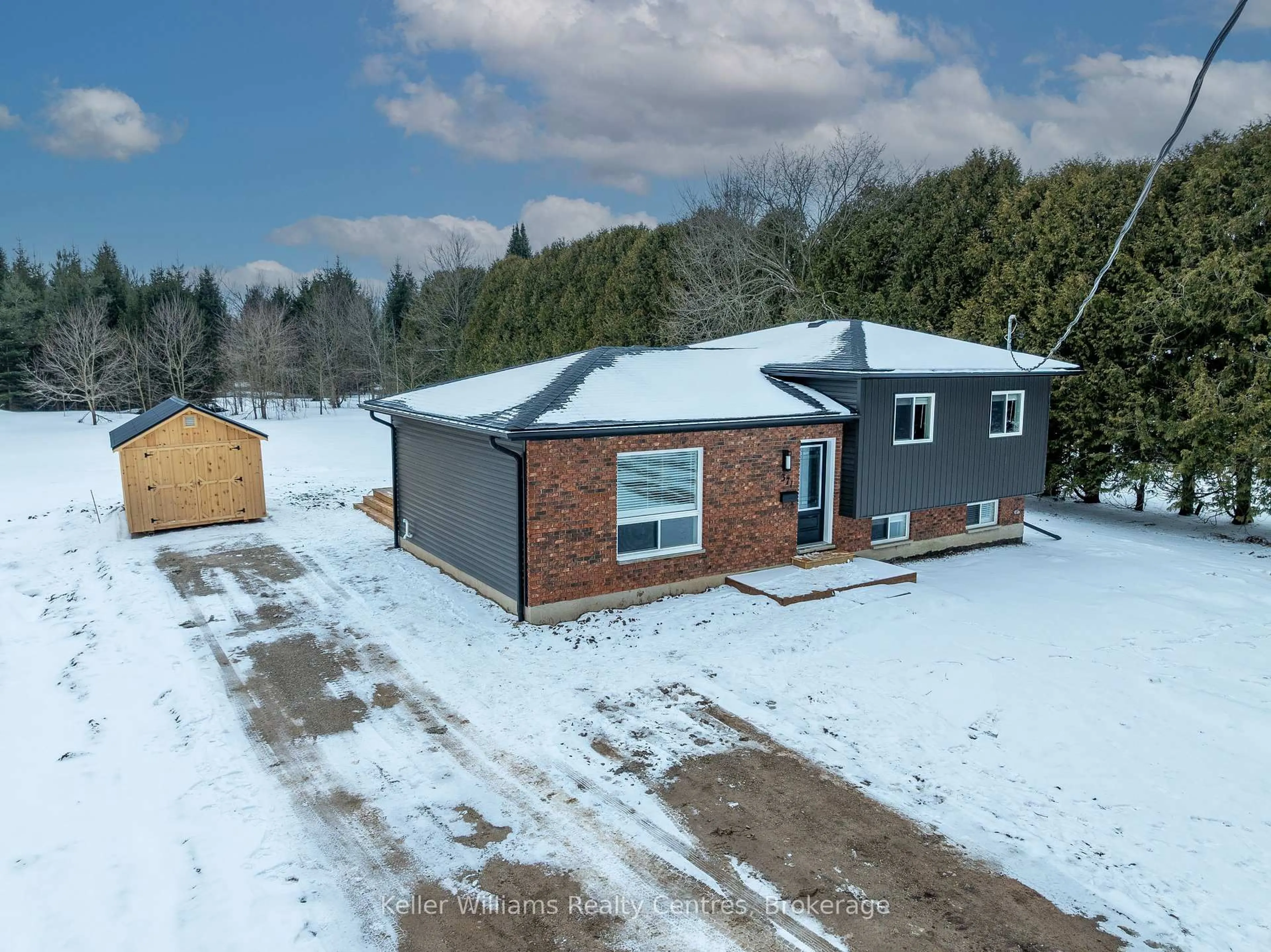 A pic from outside/outdoor area/front of a property/back of a property/a pic from drone, building for 371 First St, Georgian Bluffs Ontario N0H 2K0