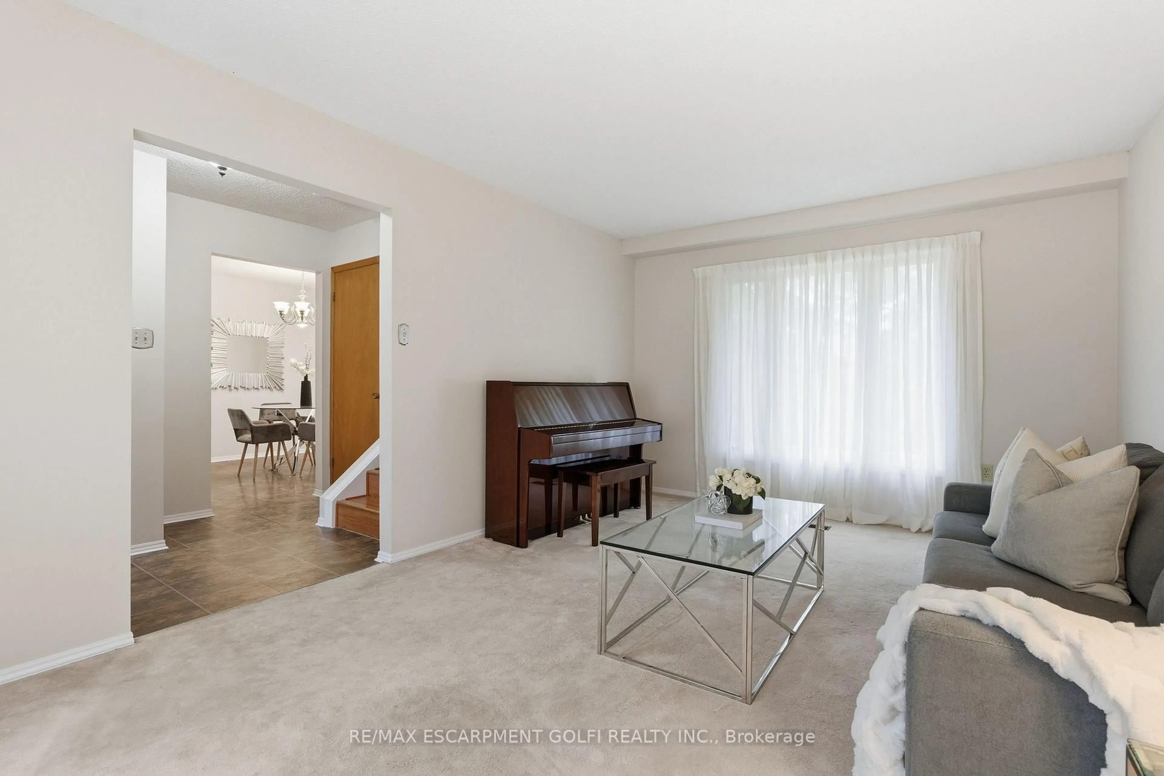 Living room with furniture, unknown for 28 Bacall Cres, Hamilton Ontario L8T 4W9