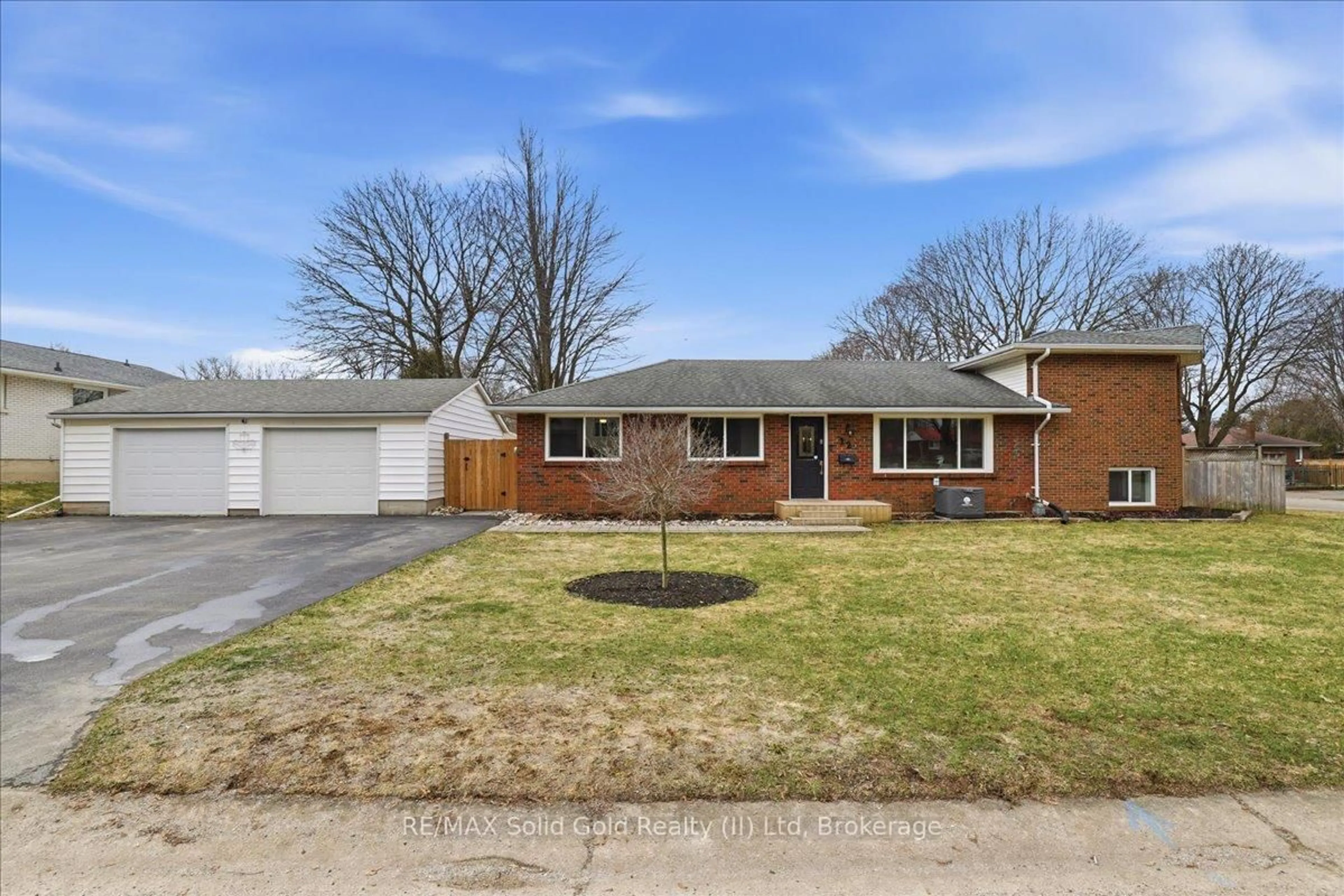 Home with brick exterior material, street for 12 Dean Cres, Ingersoll Ontario N5C 3C3