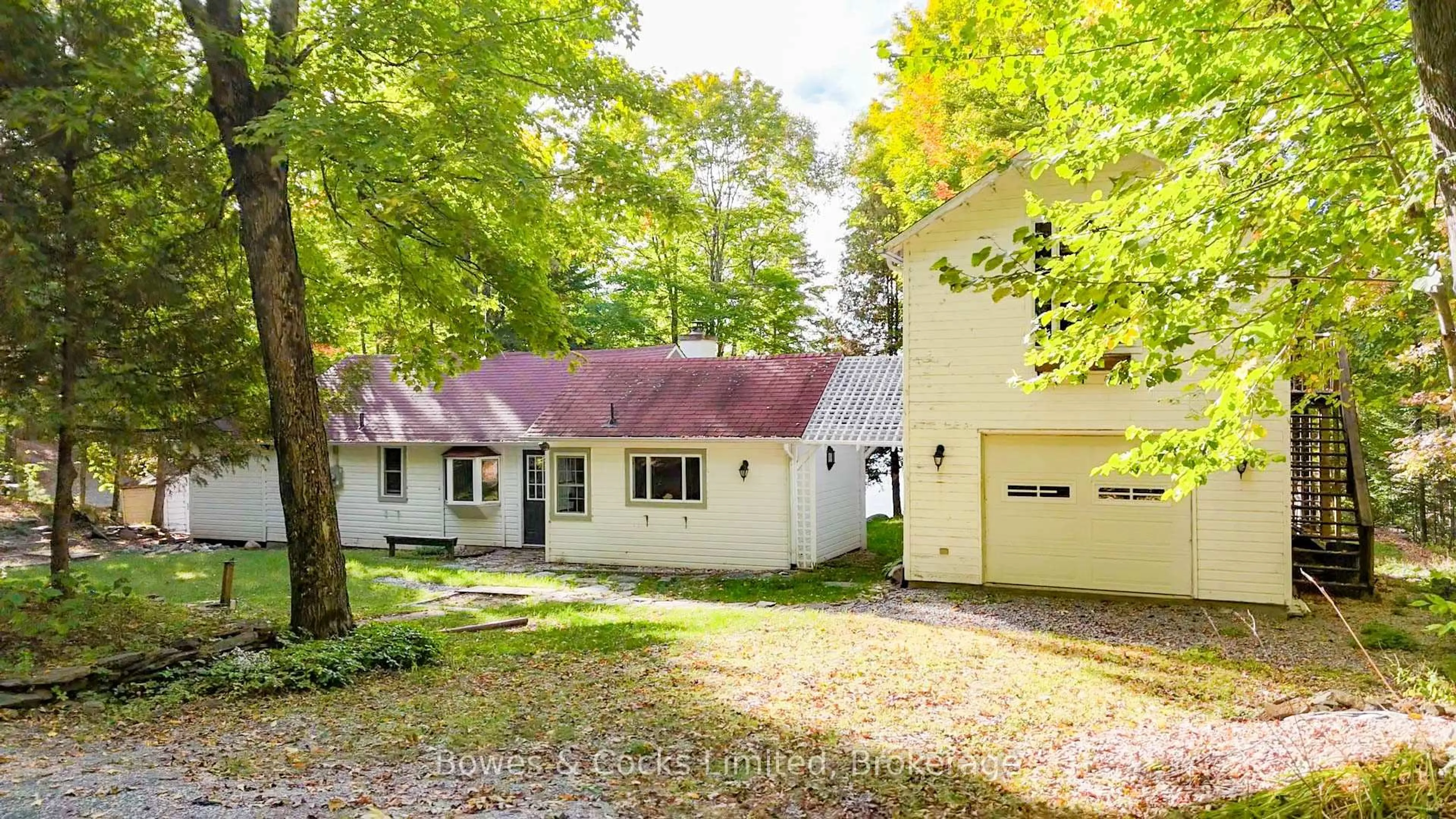 A pic from outside/outdoor area/front of a property/back of a property/a pic from drone, street for 408 Couchs Rd, North Kawartha Ontario K0L 1A0