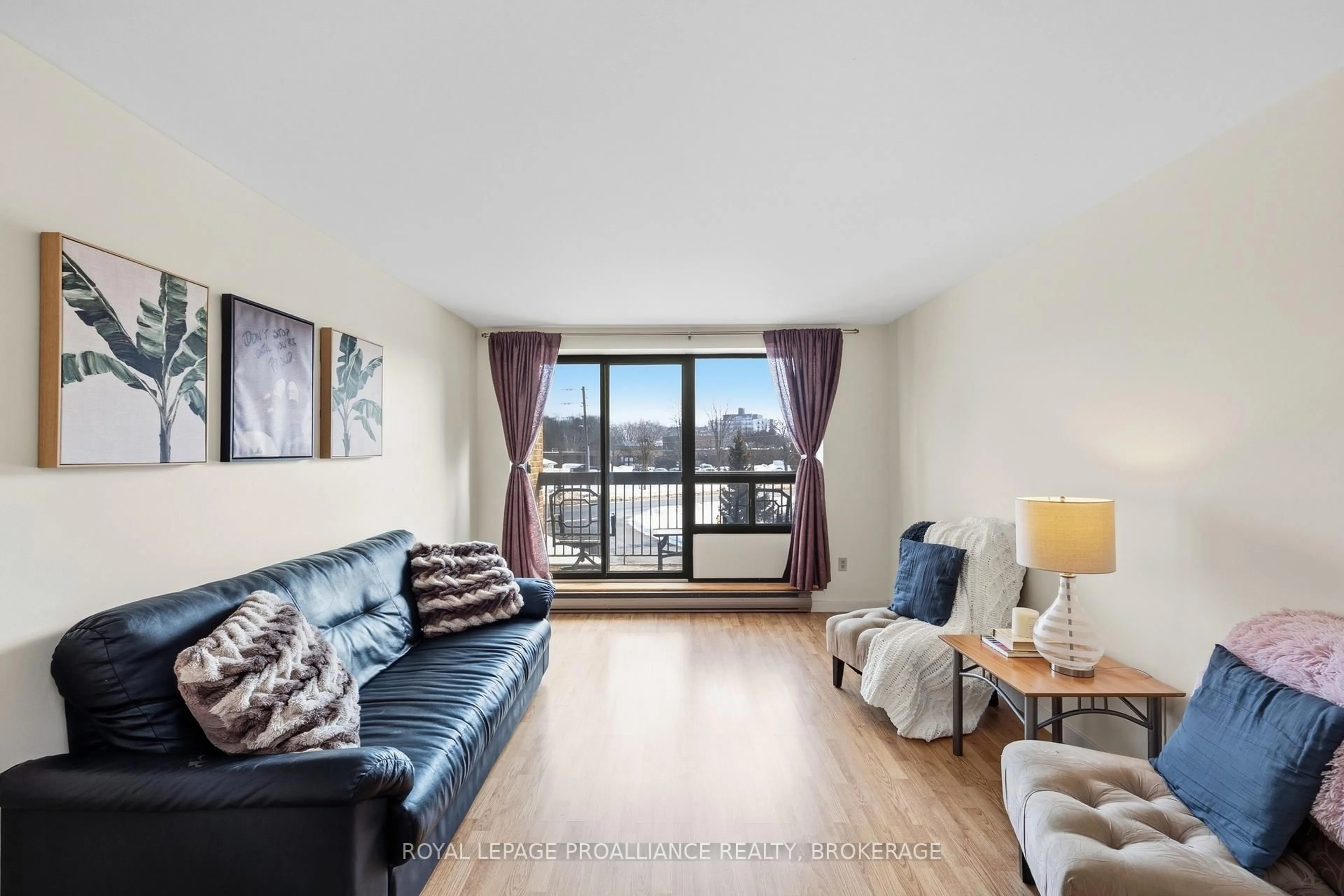 Living room with furniture, unknown for 334 Queen Mary Rd #207, Kingston Ontario K7M 7E7