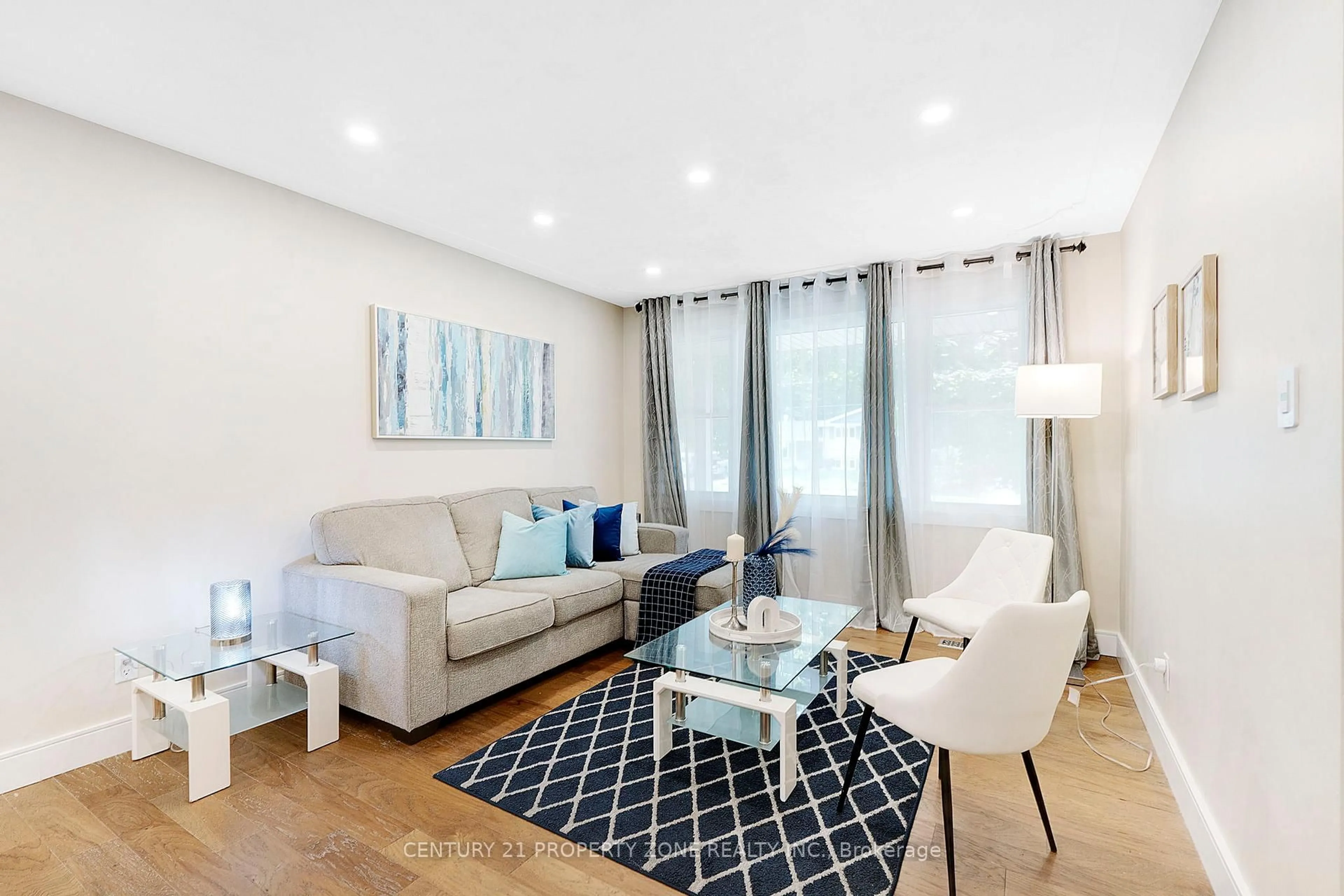 Living room with furniture, wood/laminate floor for 187 Winston Blvd, Cambridge Ontario N3C 1M1