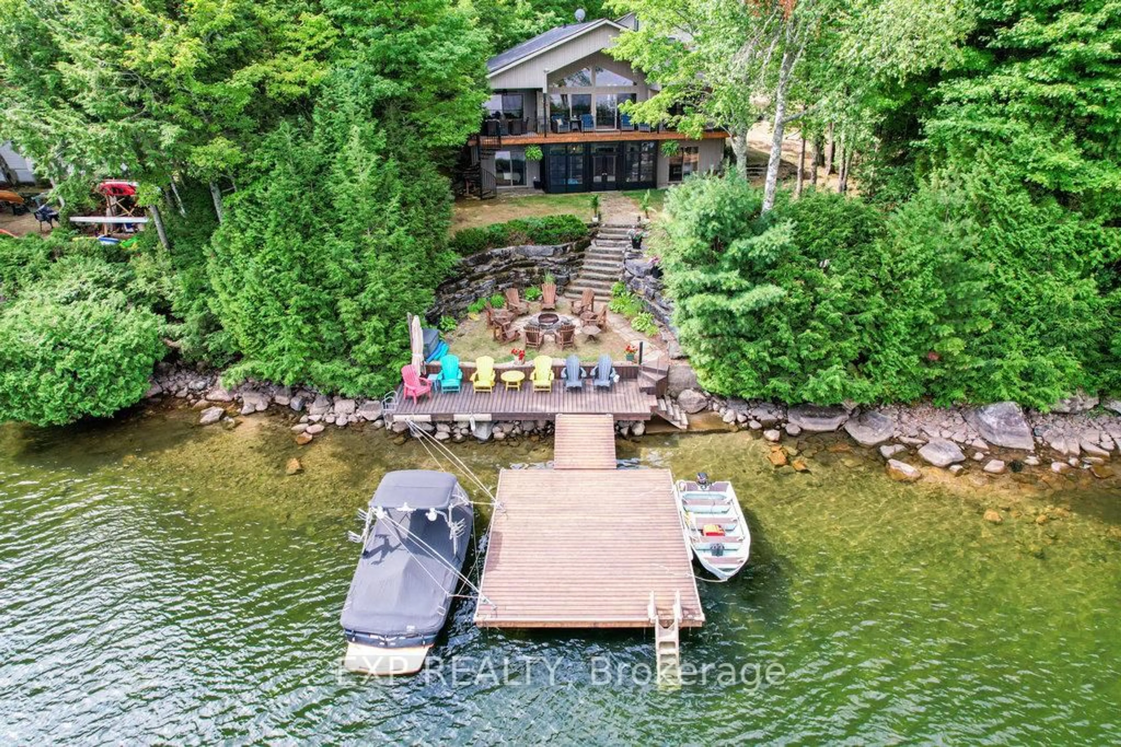 A pic from outside/outdoor area/front of a property/back of a property/a pic from drone, water/lake/river/ocean view for 27 Sylvan Dr, North Kawartha Ontario K0L 1A0