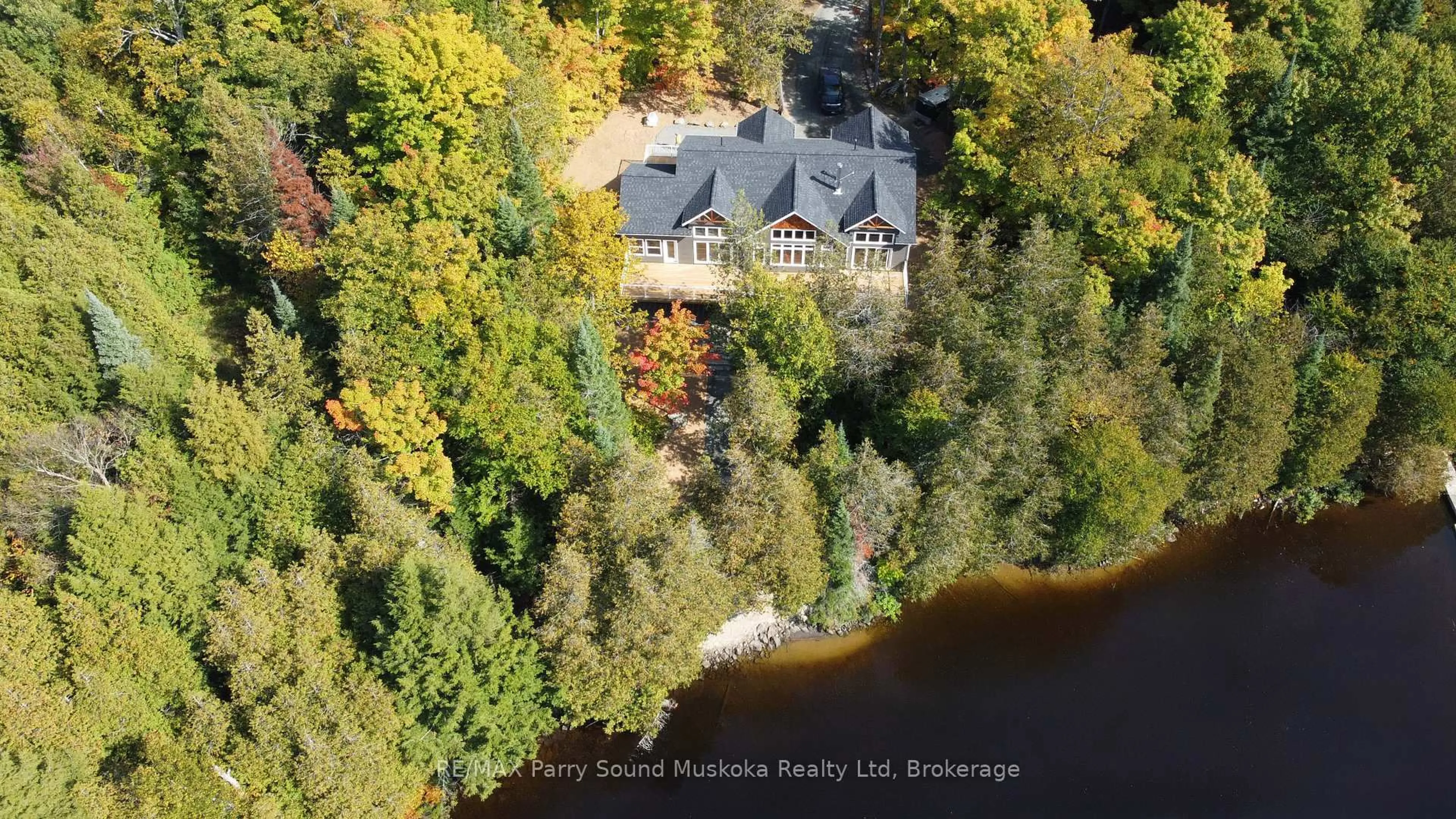 A pic from outside/outdoor area/front of a property/back of a property/a pic from drone, water/lake/river/ocean view for 13 Smokey Rd, Whitestone Ontario P0A 1G0