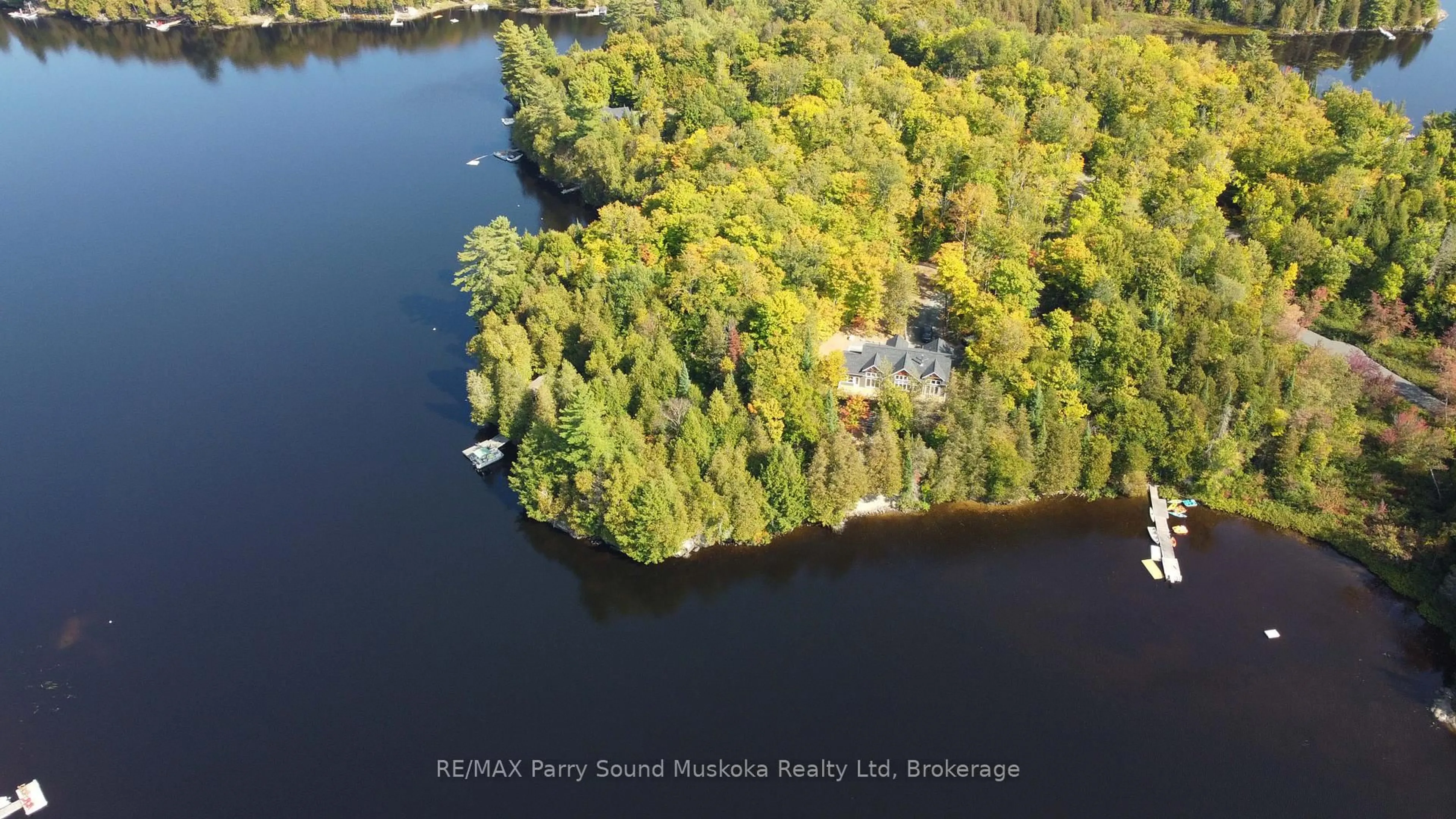 A pic from outside/outdoor area/front of a property/back of a property/a pic from drone, water/lake/river/ocean view for 13 Smokey Rd, Whitestone Ontario P0A 1G0
