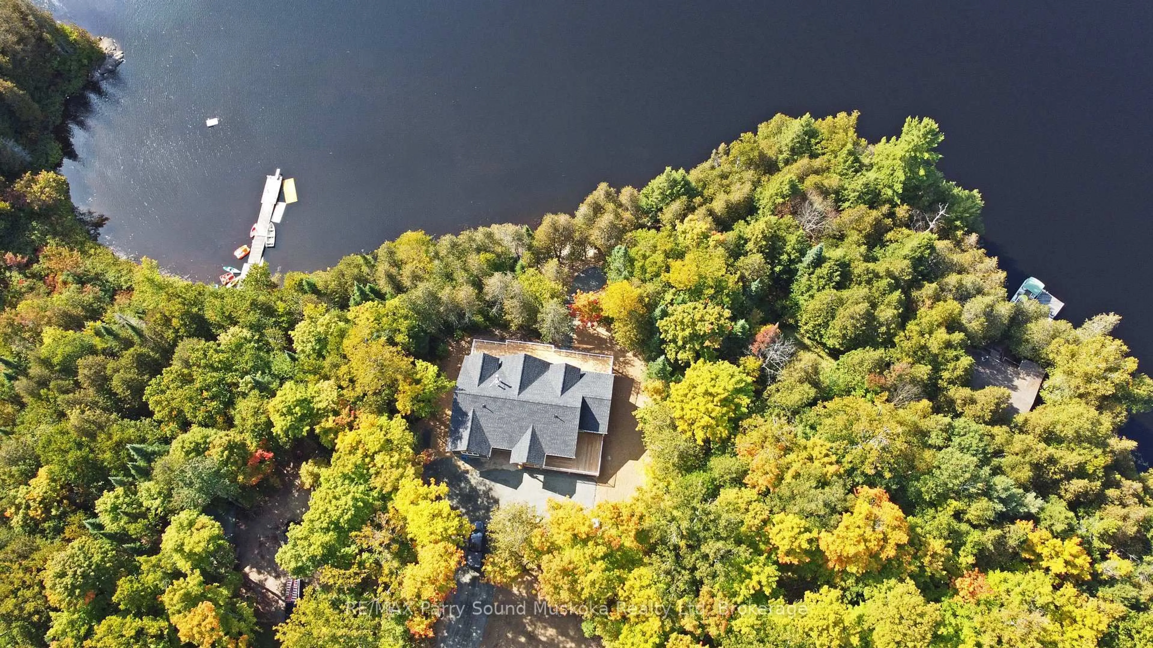 A pic from outside/outdoor area/front of a property/back of a property/a pic from drone, water/lake/river/ocean view for 13 Smokey Rd, Whitestone Ontario P0A 1G0