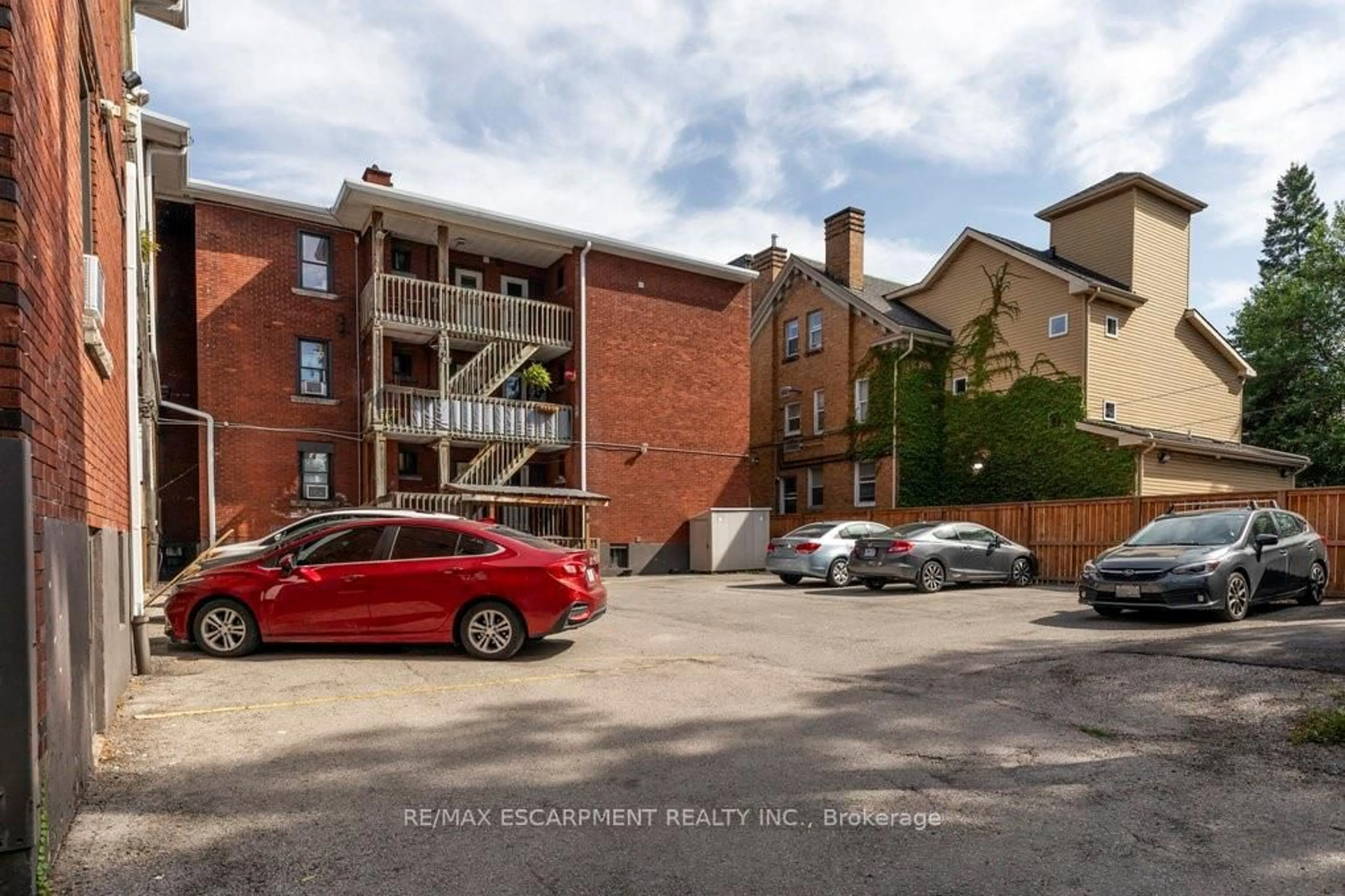 A pic from outside/outdoor area/front of a property/back of a property/a pic from drone, street for 352 HUNTER St #1, Hamilton Ontario L8N 1N8