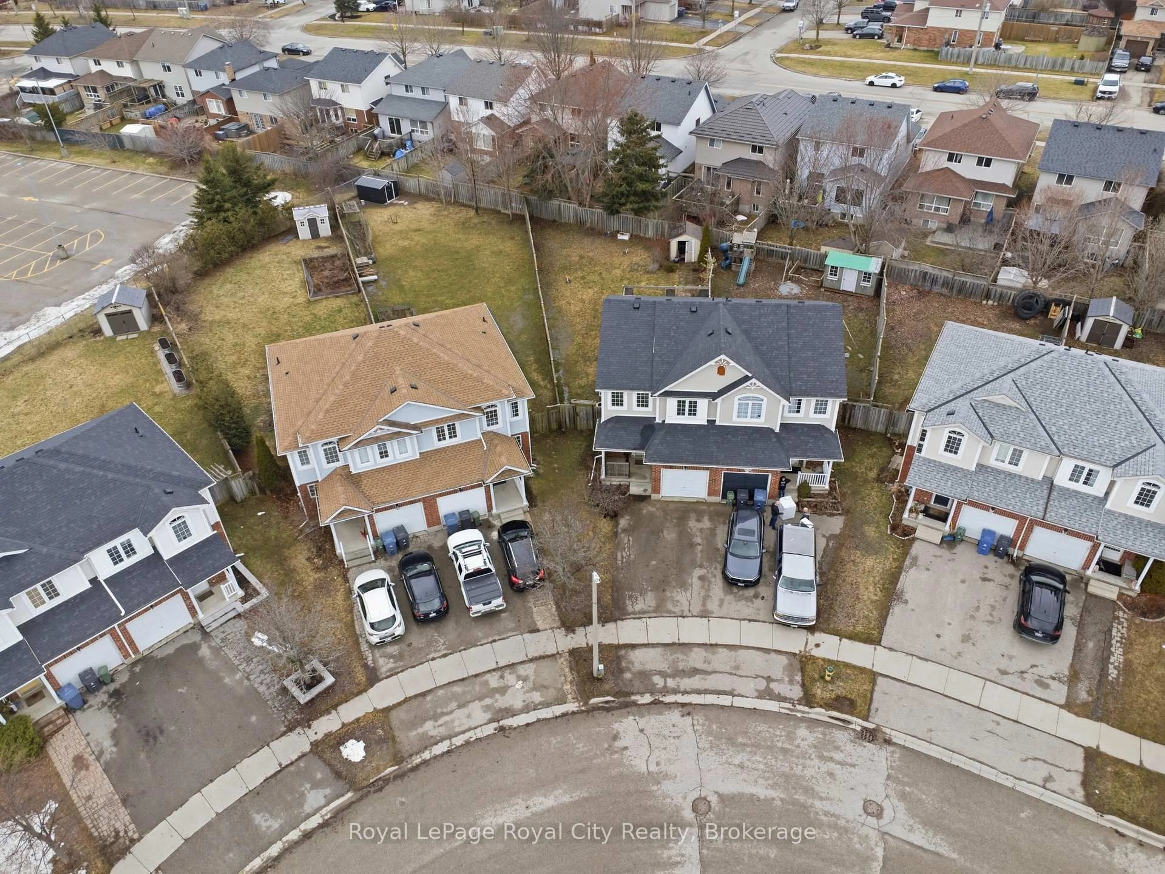 A pic from outside/outdoor area/front of a property/back of a property/a pic from drone, street for 84 Swift Cres, Guelph Ontario N1E 7J1