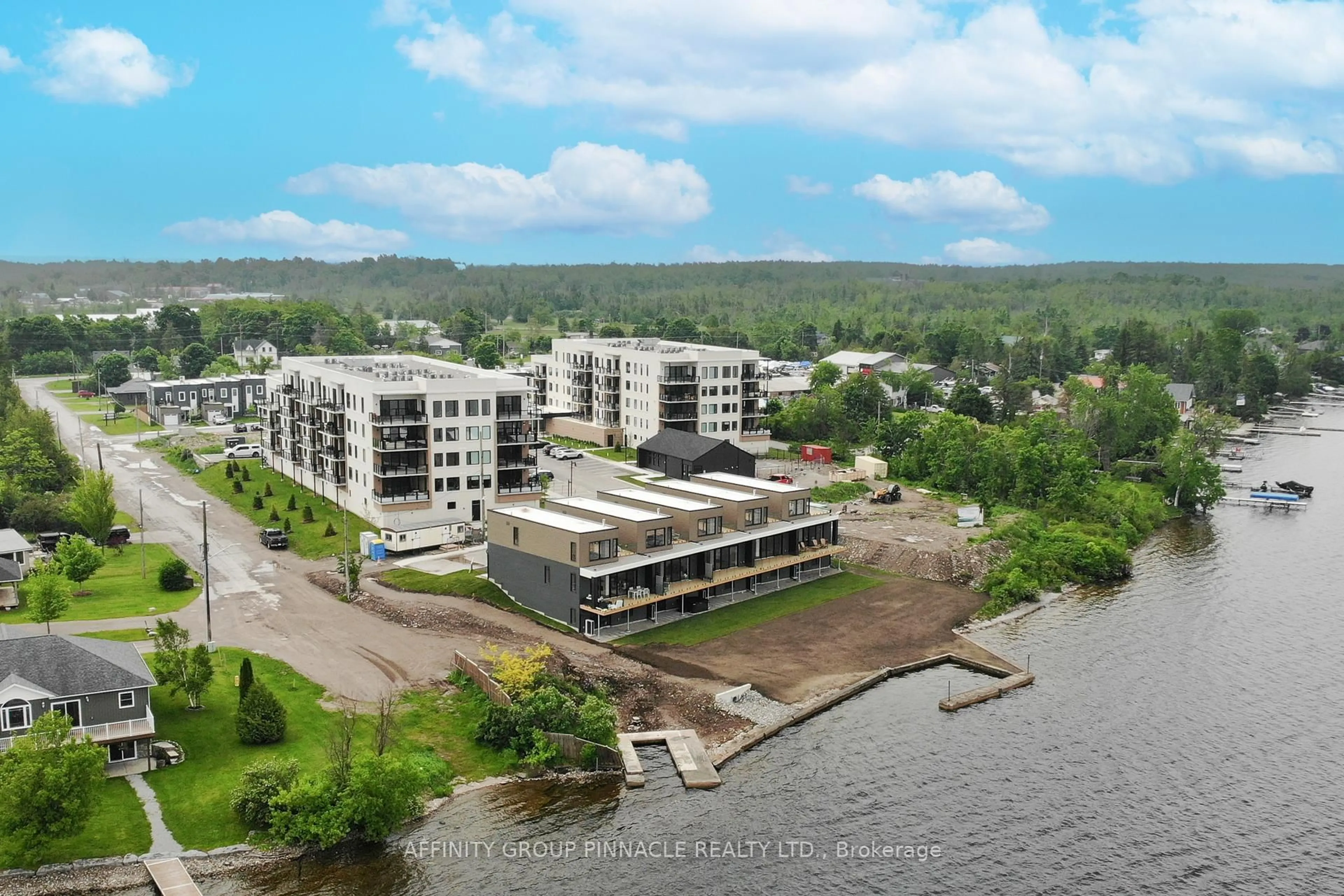 A pic from outside/outdoor area/front of a property/back of a property/a pic from drone, water/lake/river/ocean view for 19 A West St #302, Kawartha Lakes Ontario K0M 1N0