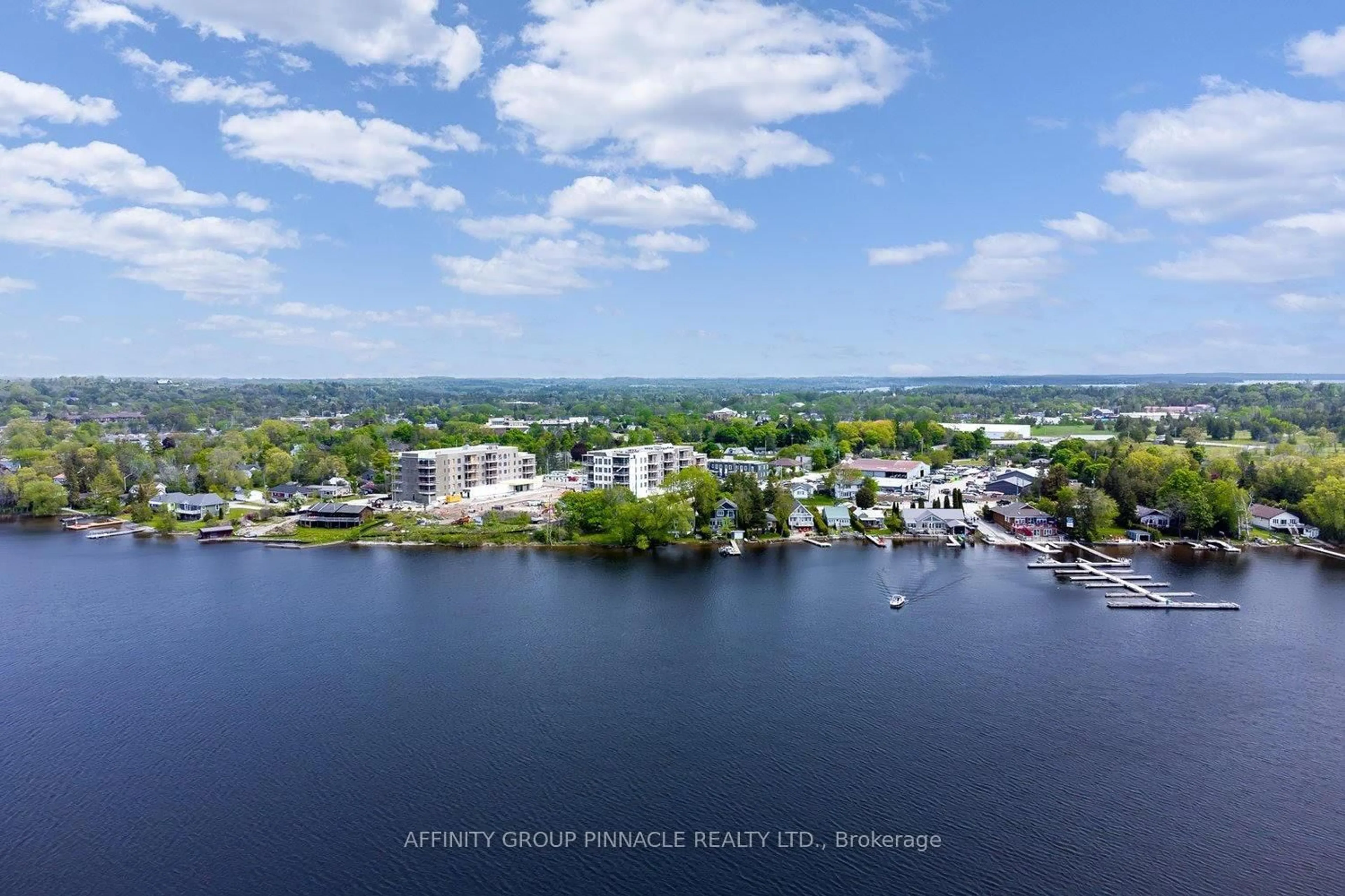 A pic from outside/outdoor area/front of a property/back of a property/a pic from drone, water/lake/river/ocean view for 19 A West St #302, Kawartha Lakes Ontario K0M 1N0