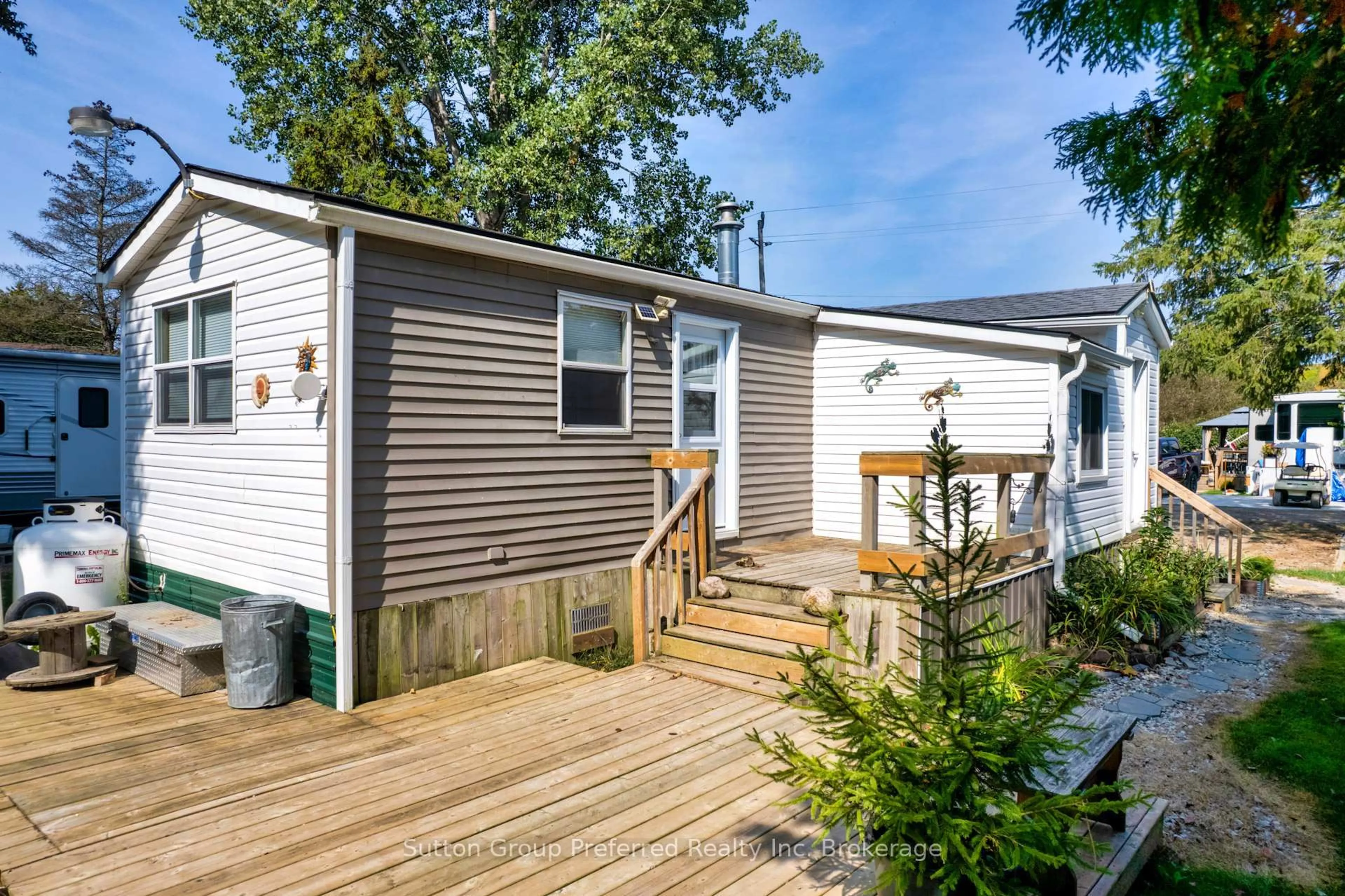 Home with vinyl exterior material, street for 495856 10th Line #94, East Zorra-Tavistock Ontario N4S 7V7